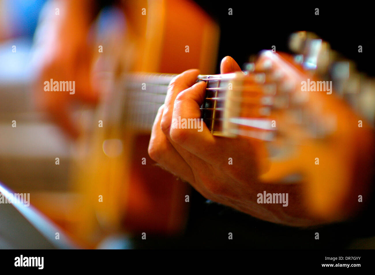 musicians playing saxophone and guitar Stock Photo