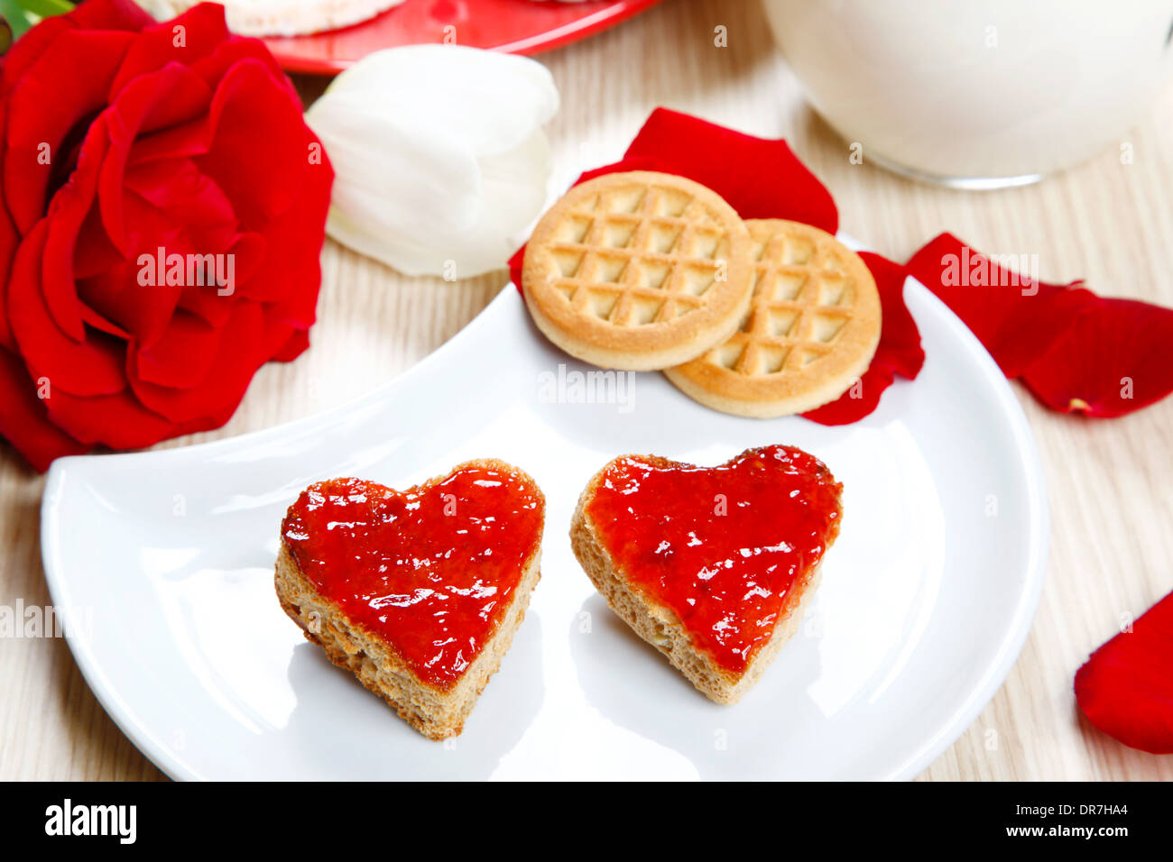 a sweet breackfast with love and red hearths of jam Stock Photo - Alamy