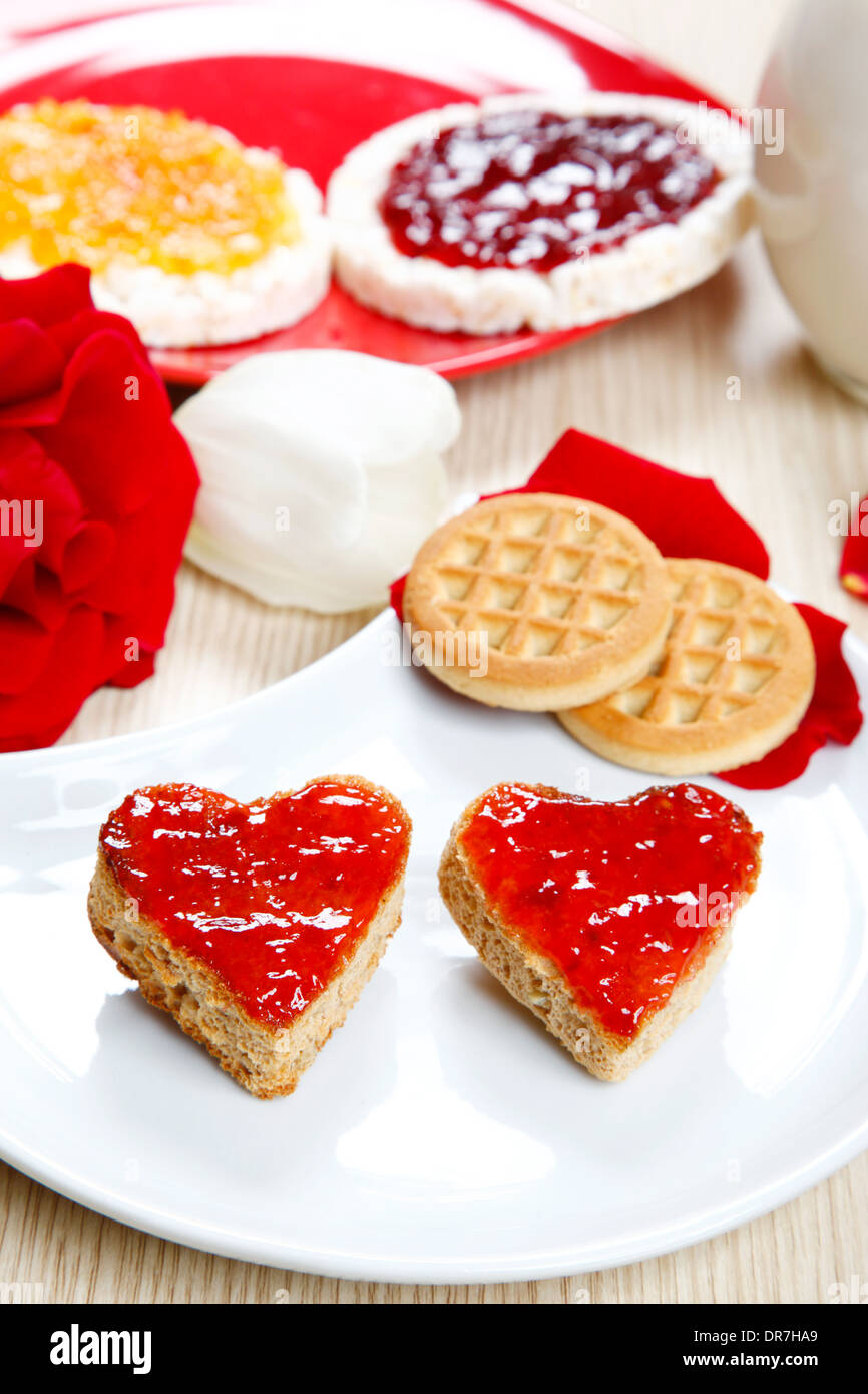 a sweet breackfast with love and red hearths of jam Stock Photo - Alamy