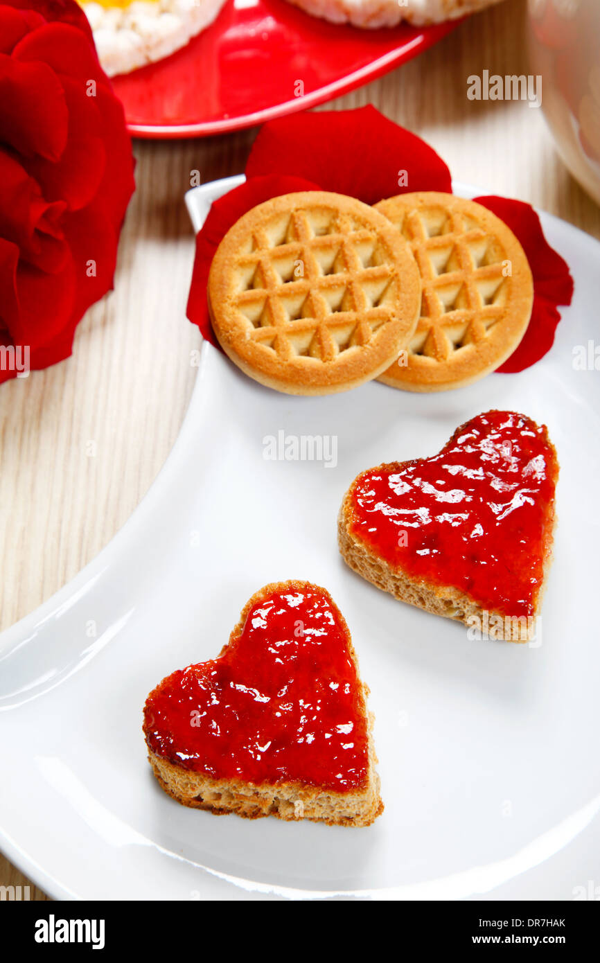 a sweet breackfast with love and red hearths of jam Stock Photo - Alamy
