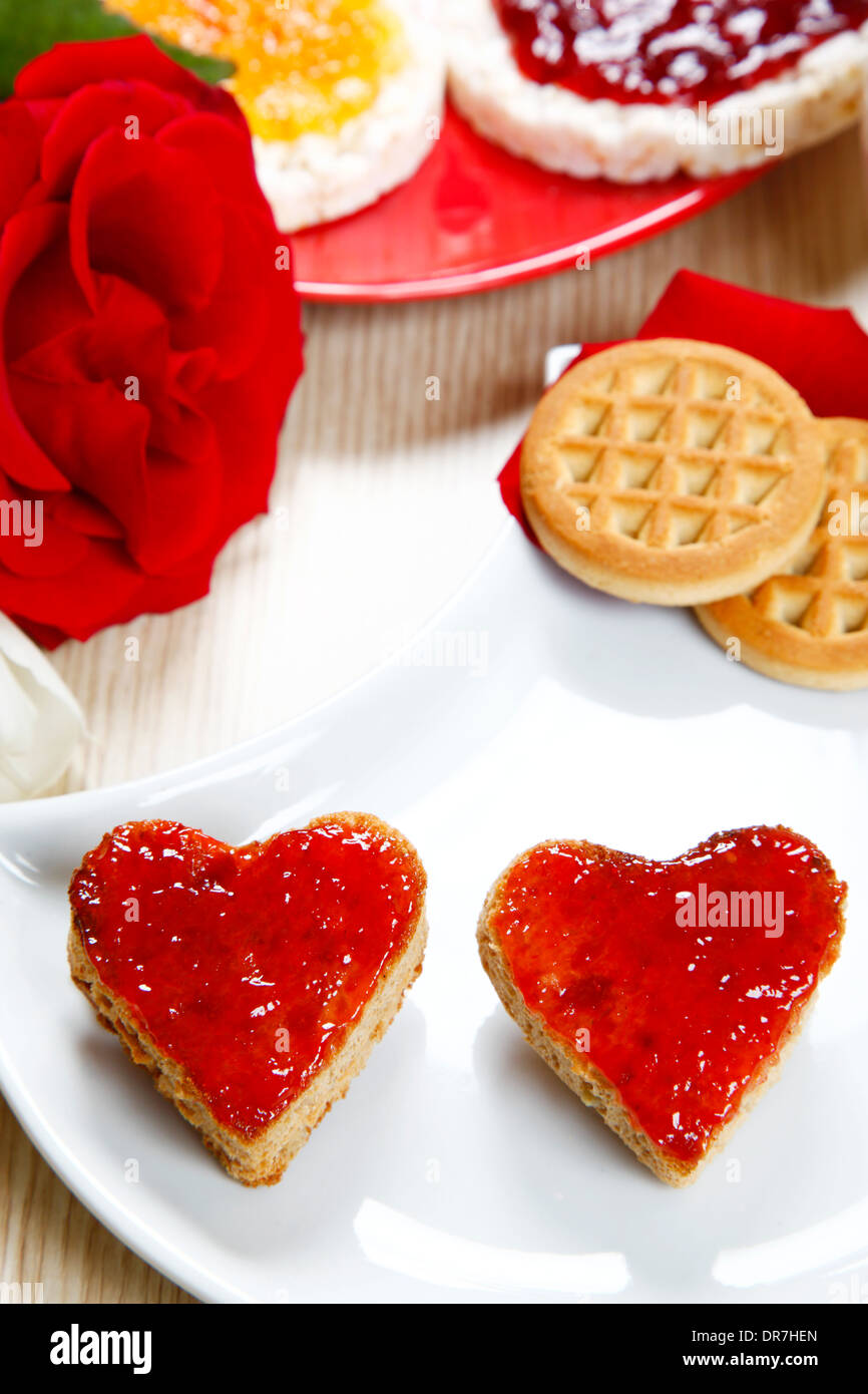 a sweet breackfast with love and red hearths of jam Stock Photo - Alamy