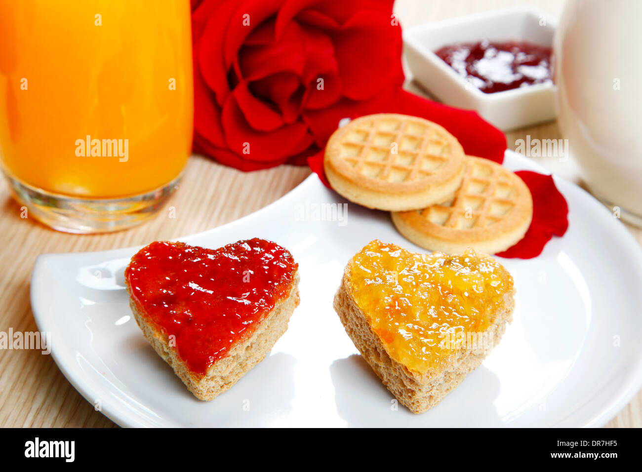 a sweet breackfast with love and red hearths of jam Stock Photo - Alamy