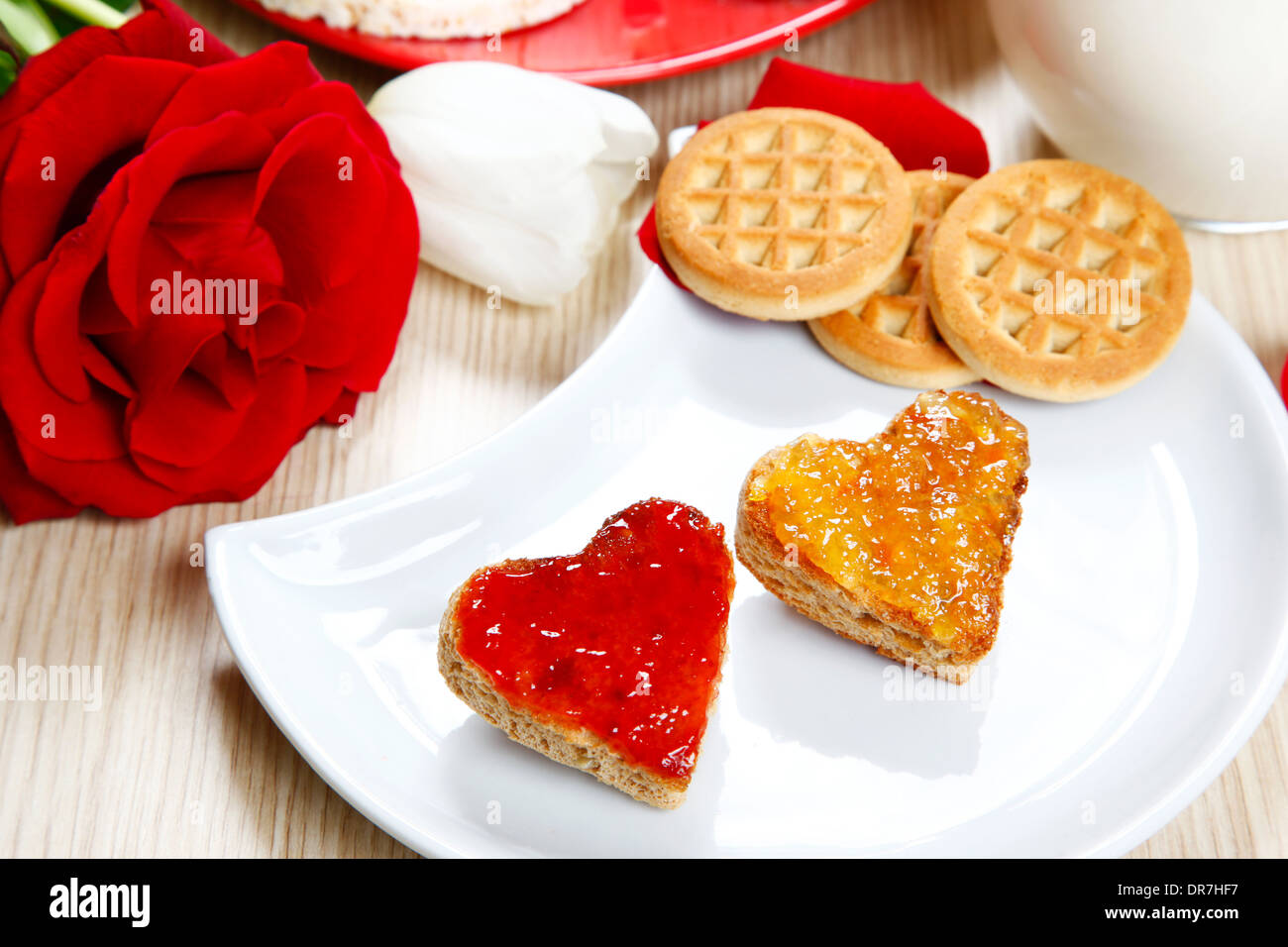 a sweet breackfast with love and red hearths of jam Stock Photo - Alamy