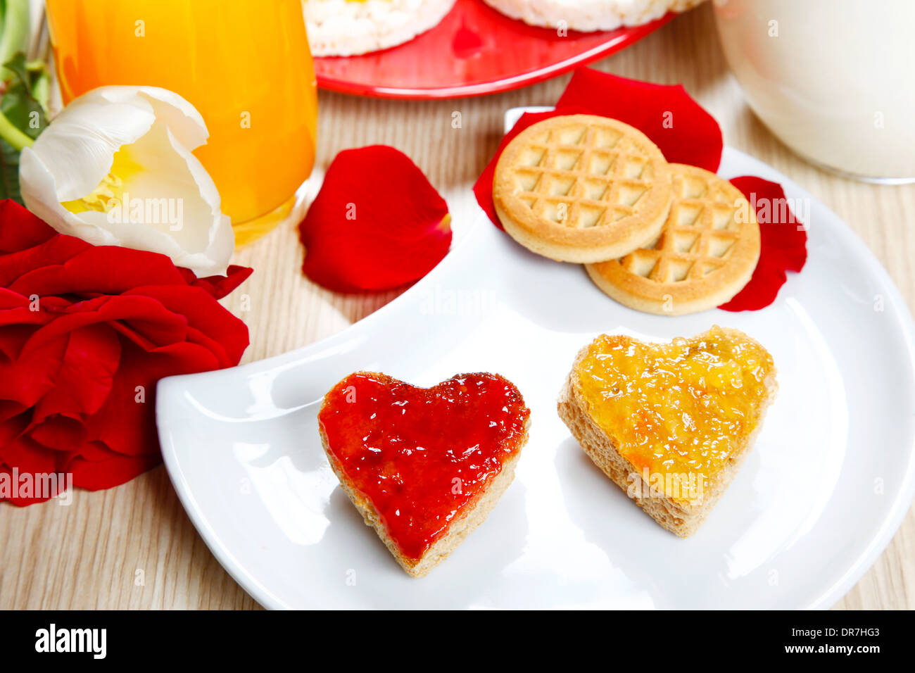 a sweet breackfast with love and red hearths of jam Stock Photo - Alamy