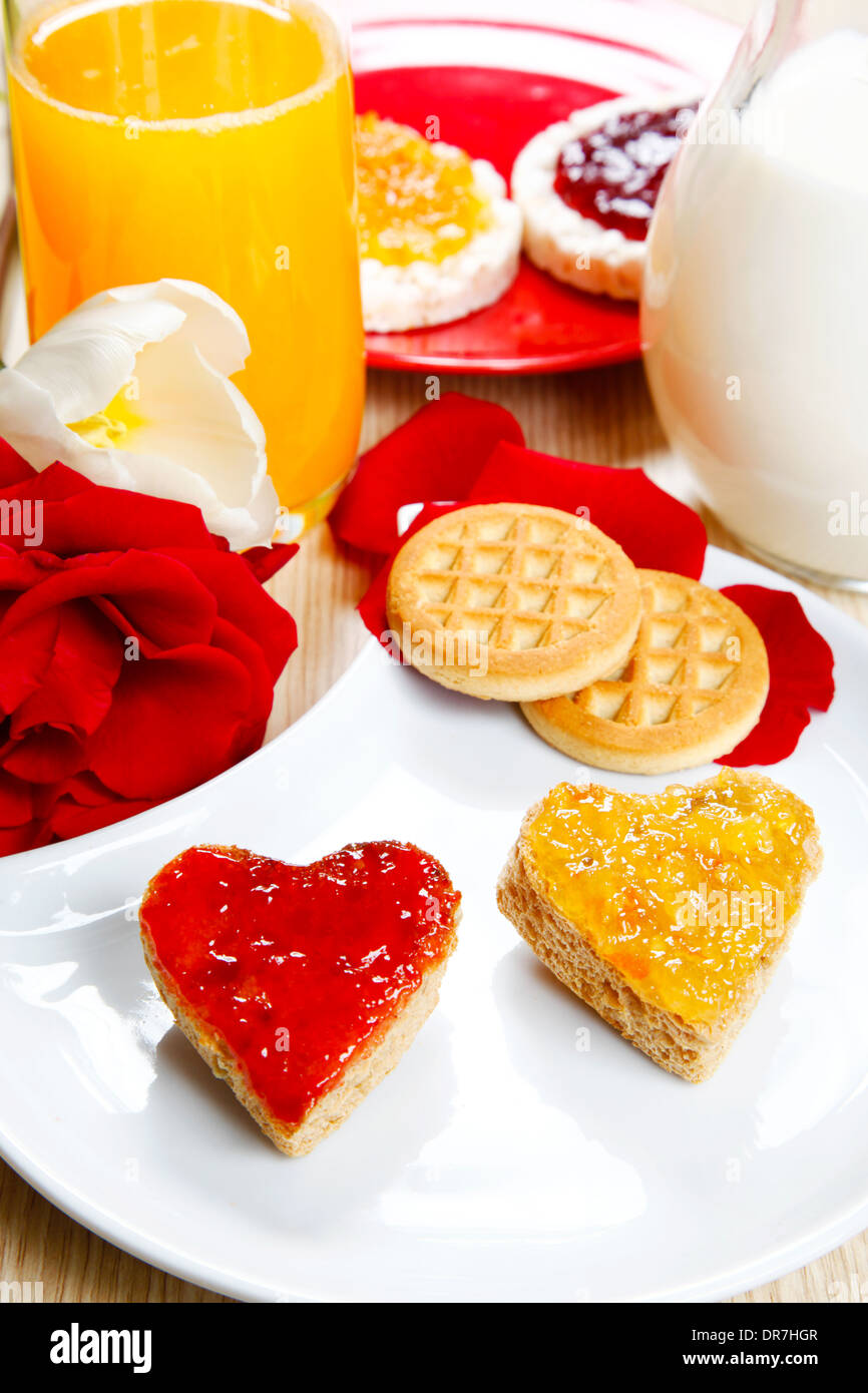 a sweet breackfast with love and red hearths of jam Stock Photo - Alamy