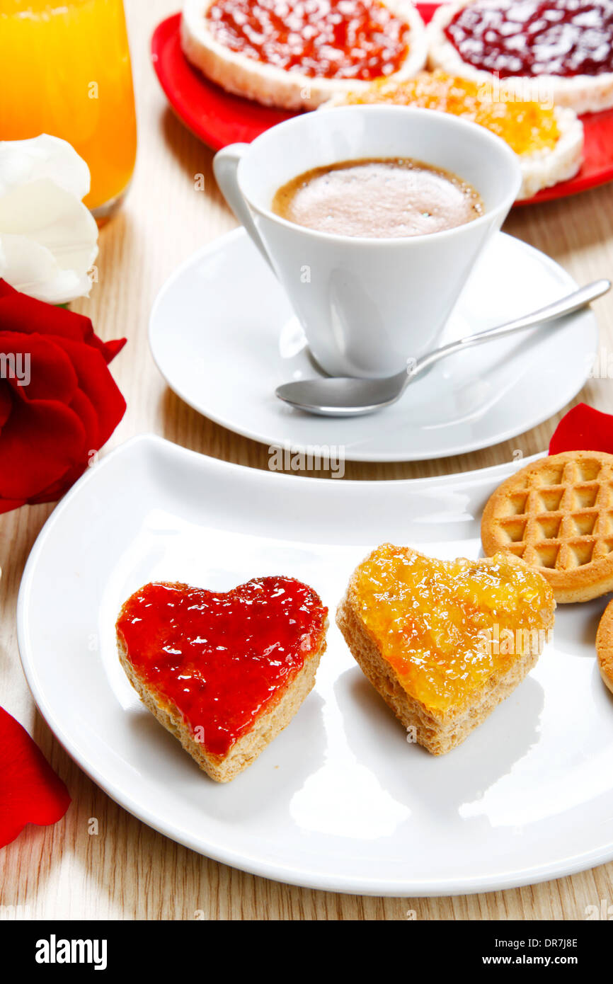 a sweet breackfast with love and red hearths of jam Stock Photo - Alamy