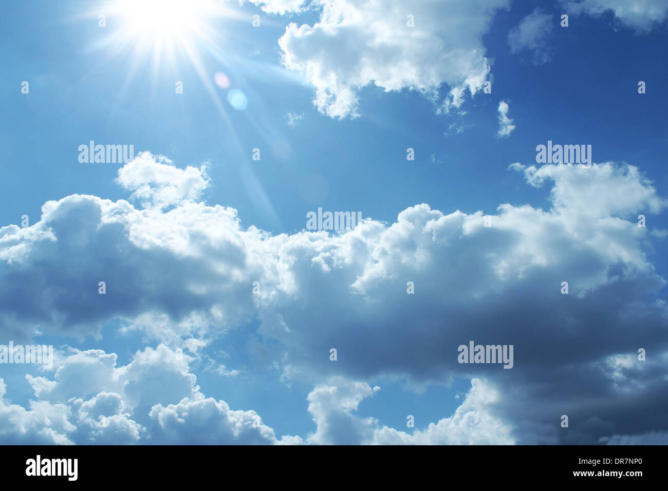 Cloudy stormy sky with sun Stock Photo - Alamy