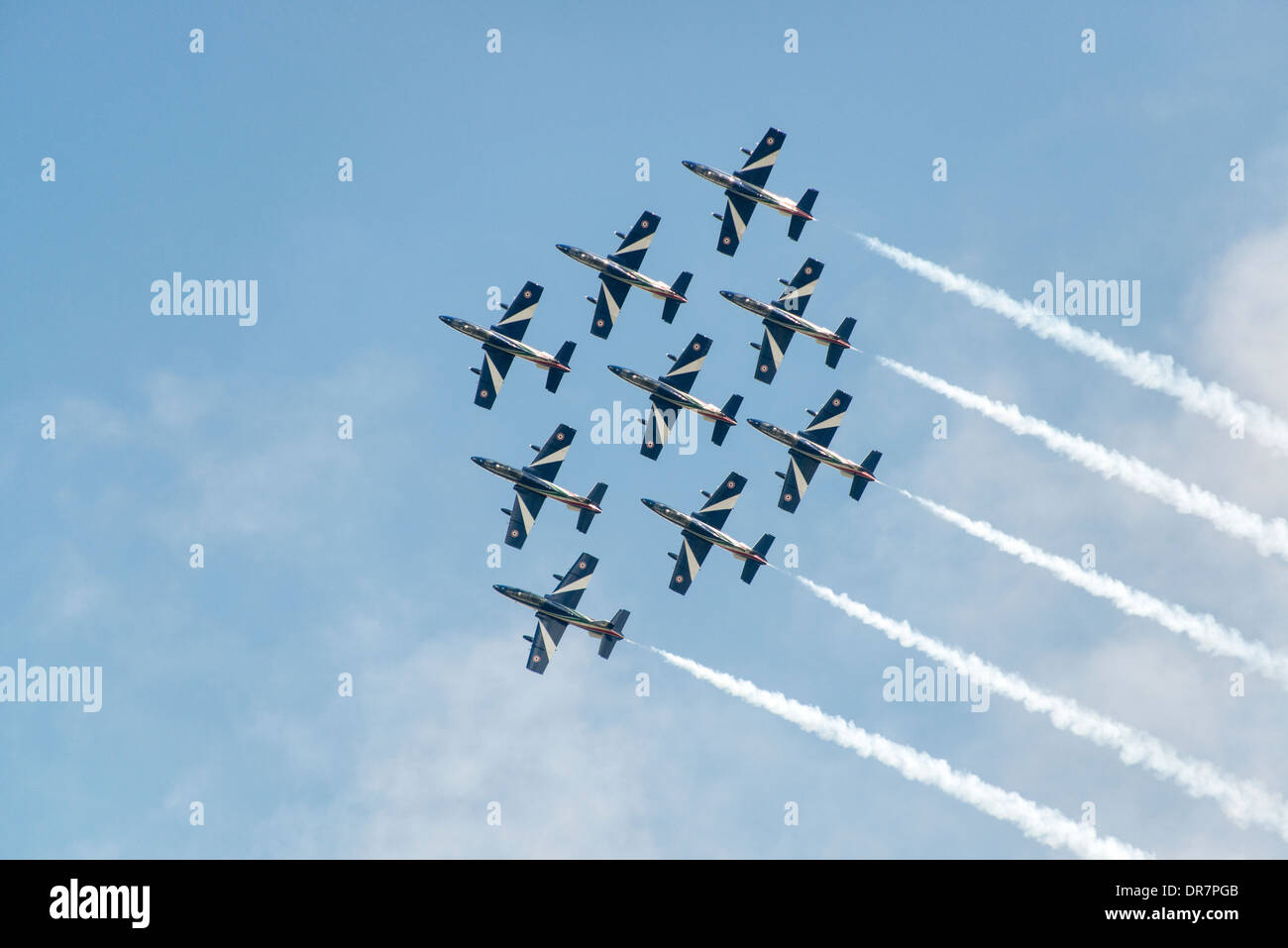 The Italian Military Aerobatic Display Team Il Frecce Tricolori trailing smoke trails in perfect diamond formation at the RIAT Stock Photo