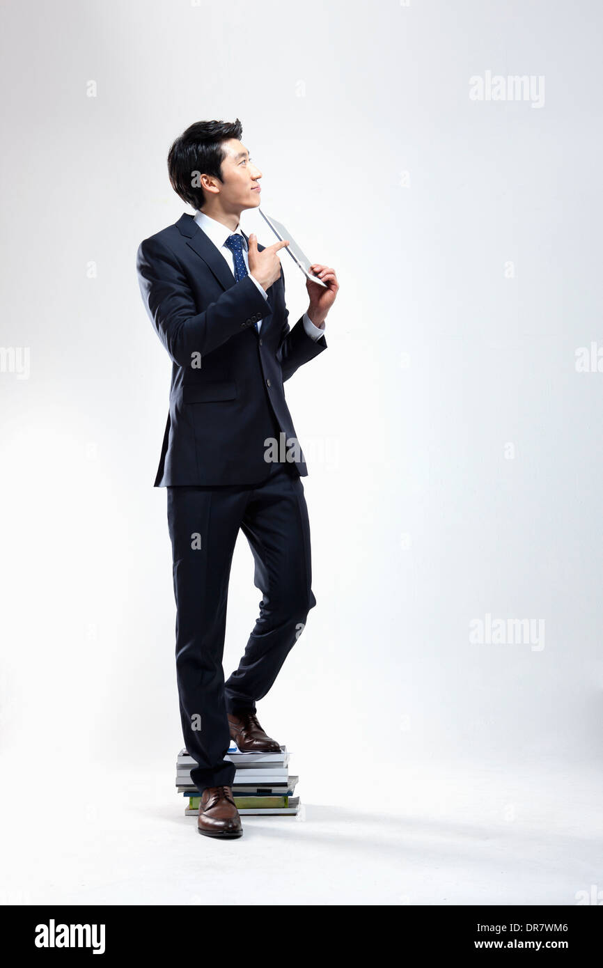 businessman holding a tablet PC Stock Photo