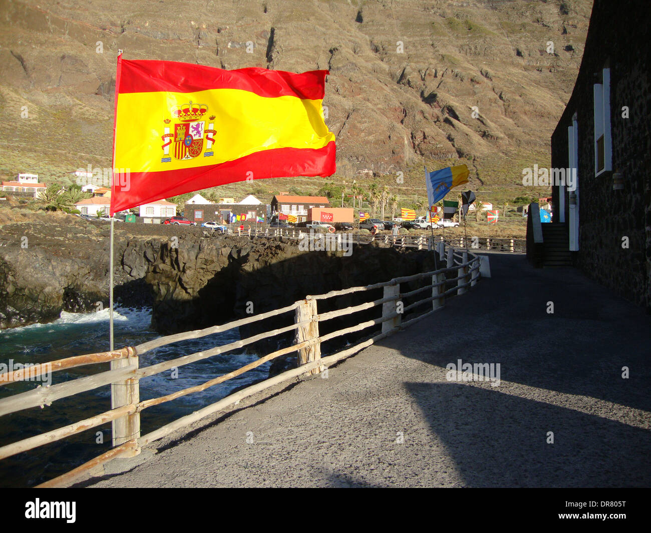 Flag of Spain, located on the coast of El Hierro, Canary Islands Stock Photo