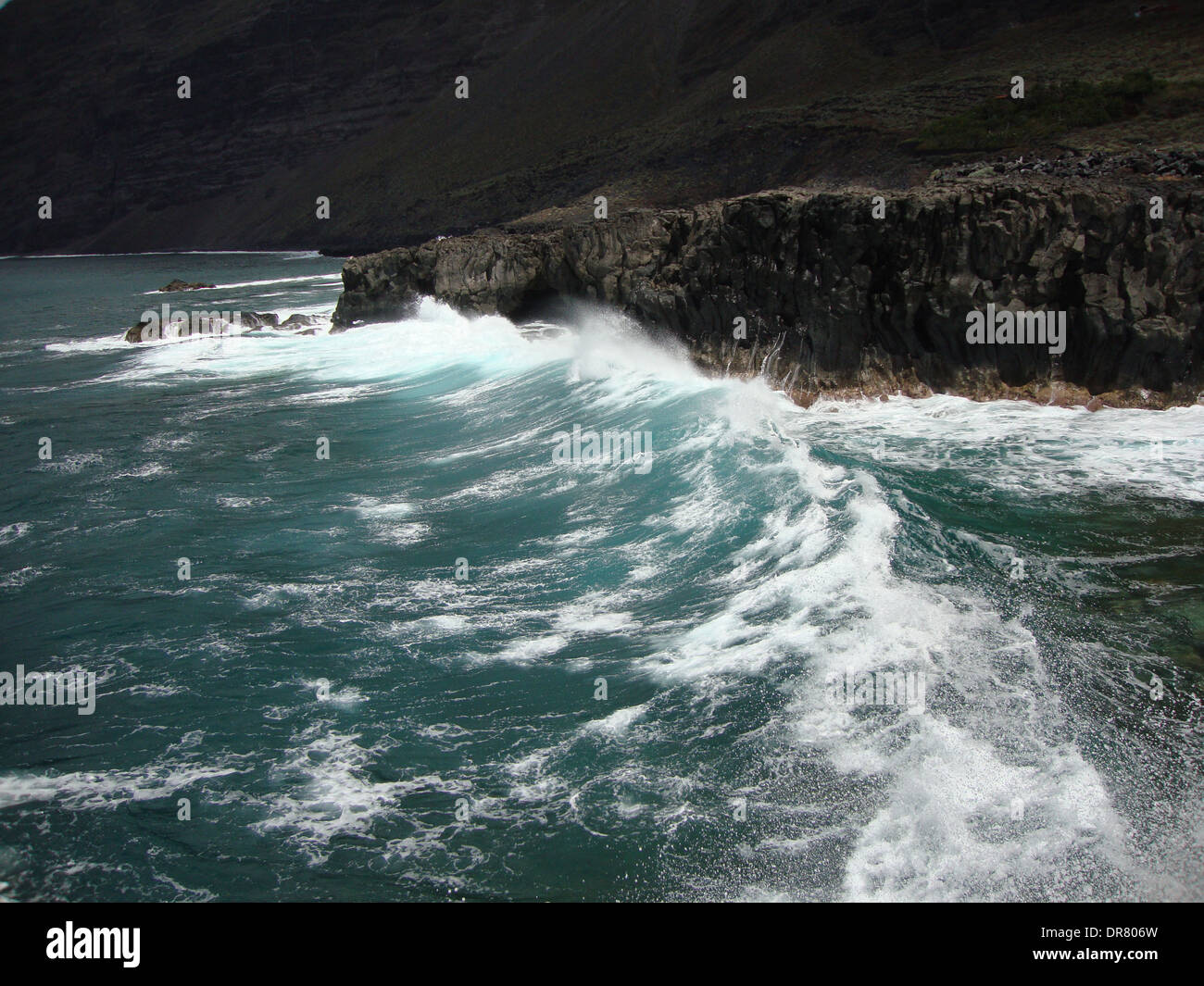 Waves in the volcanic coast of El Hierro, Canary Island, Spain Stock Photo