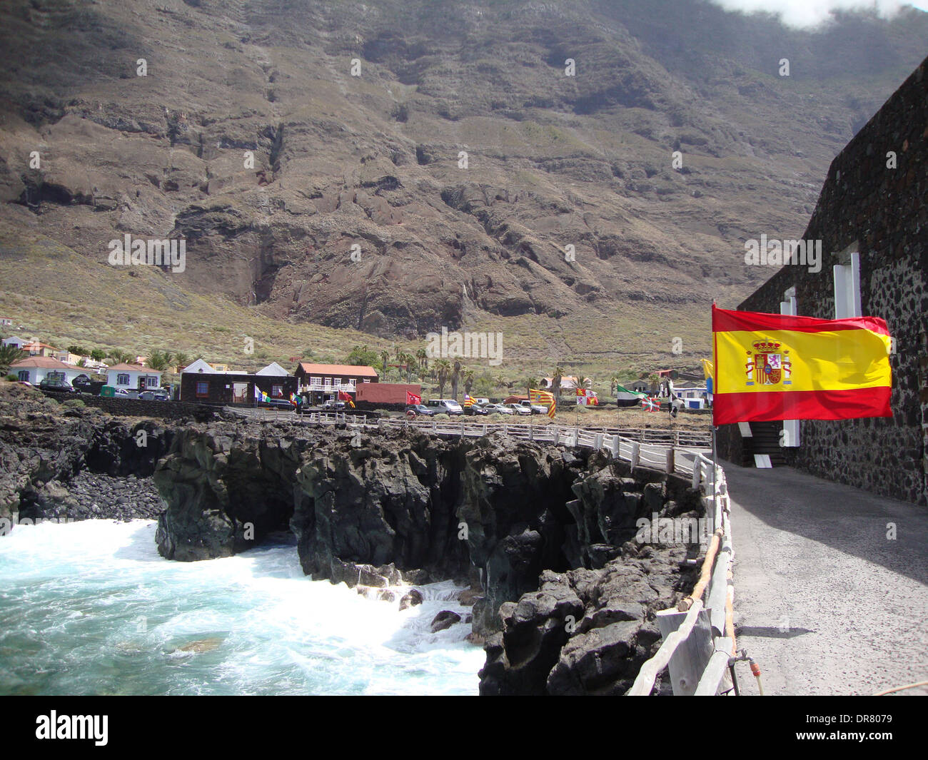 Flag of Spain, located on the coast of El Hierro, Canary Islands Stock Photo