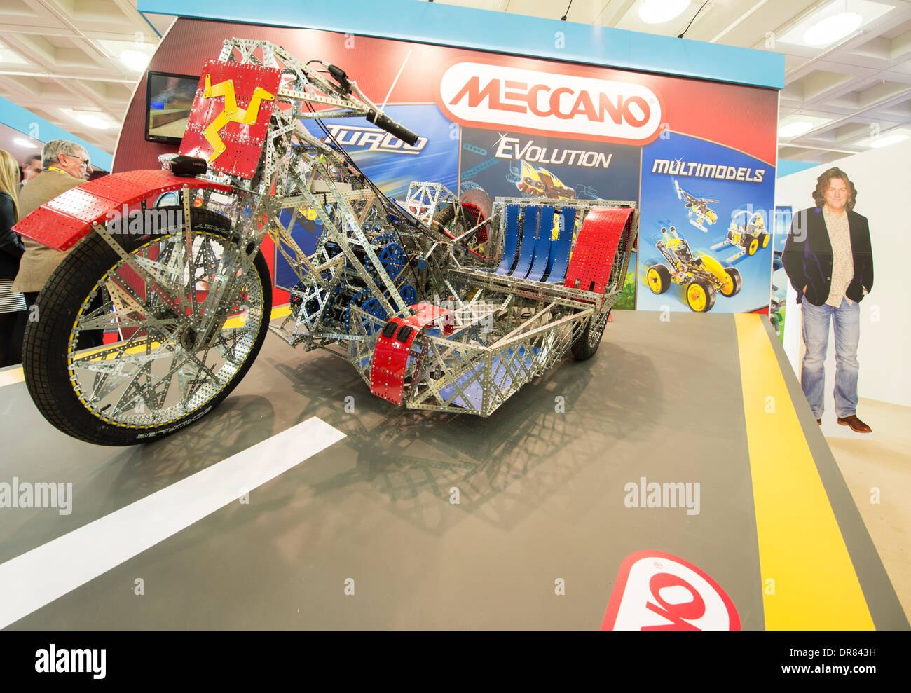 London, UK. 21st January 2014. The full-sized fully working Meccano motorbike and sidecar on display at the Toy Fair. This model was created for the James May’s Toy Stories TV programme and completed the Isle of Man TT circuit. The Toy Fair will once again be showcasing thousands of brand new toys, games and hobbies to the UK's largest gathering of toy industry professionals.  Credit: Malcolm Park editorial/Alamy Live News Stock Photo