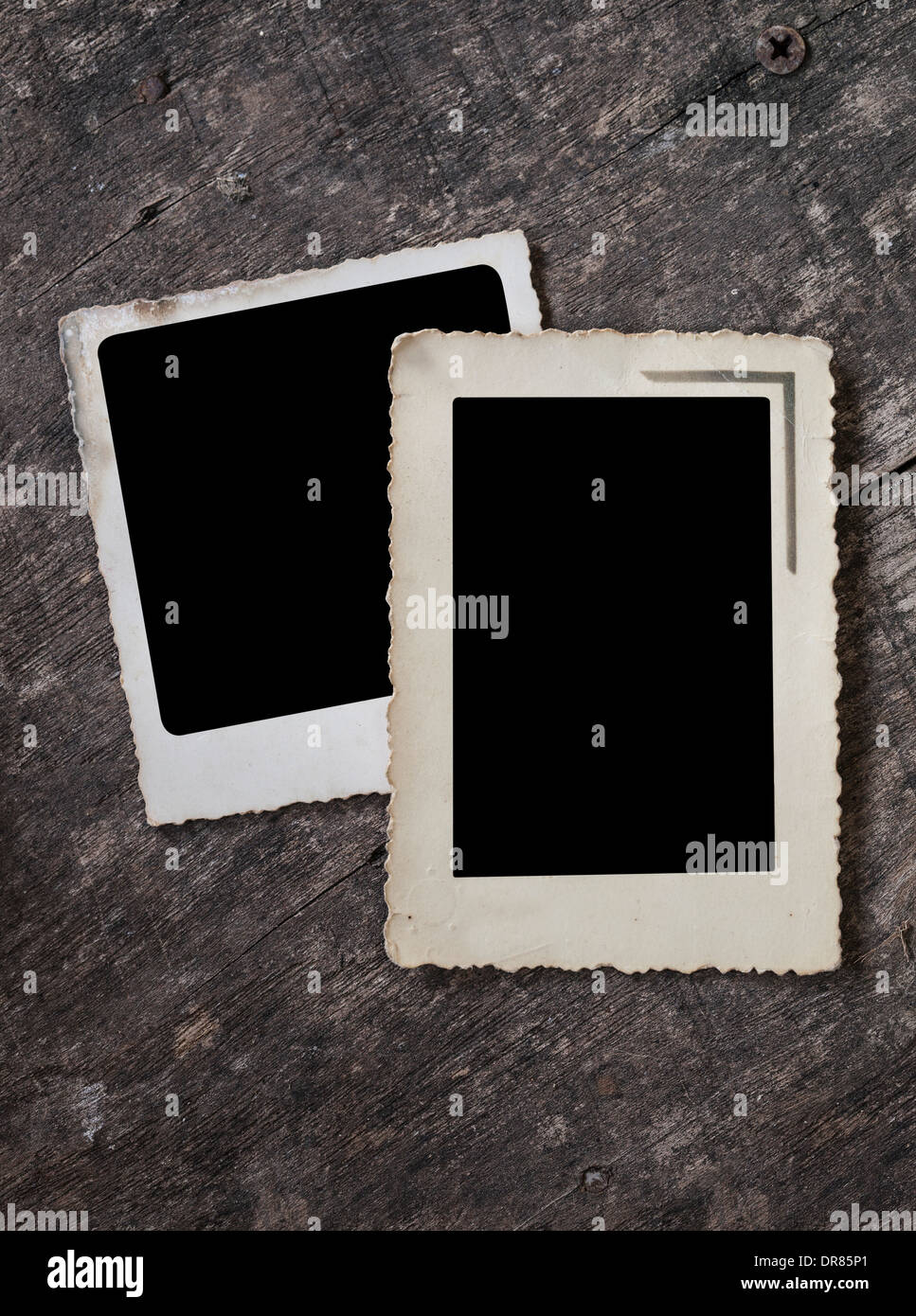 empty old photos frame on wooden wall Stock Photo - Alamy