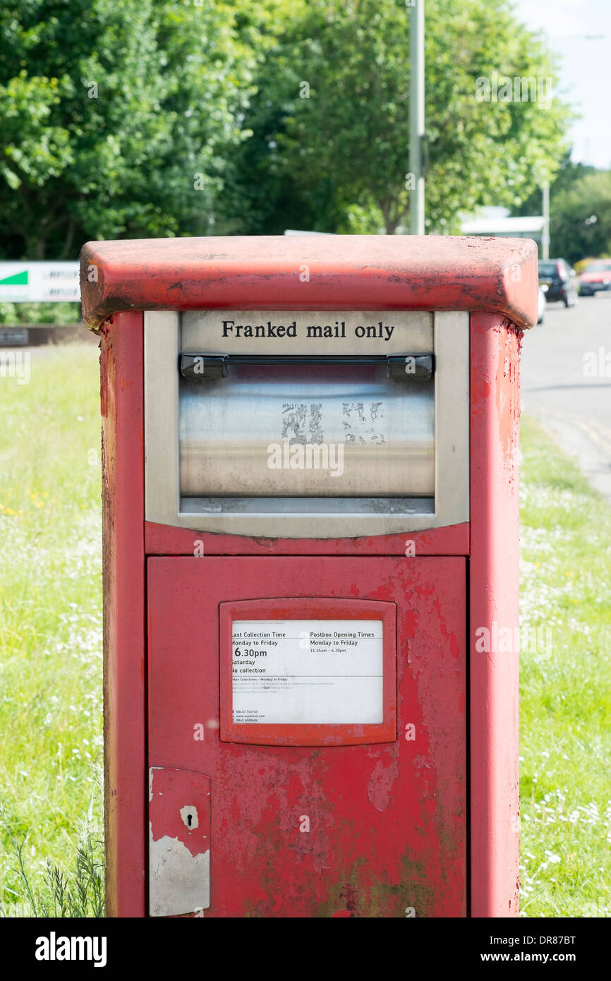 UK franked mail post box Stock Photo