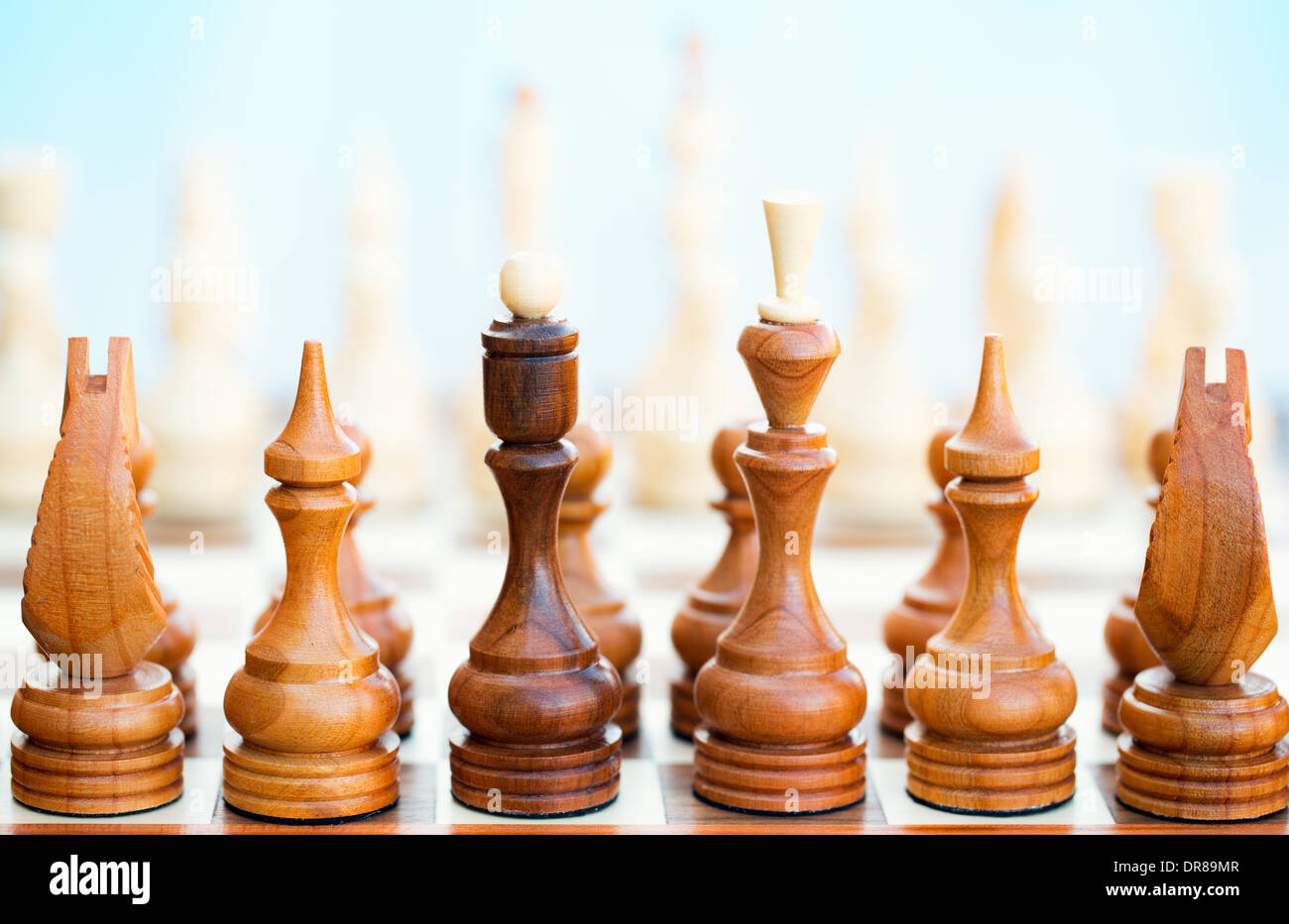 Chess pieces in starting position on a wooden oak Board Stock Photo - Alamy