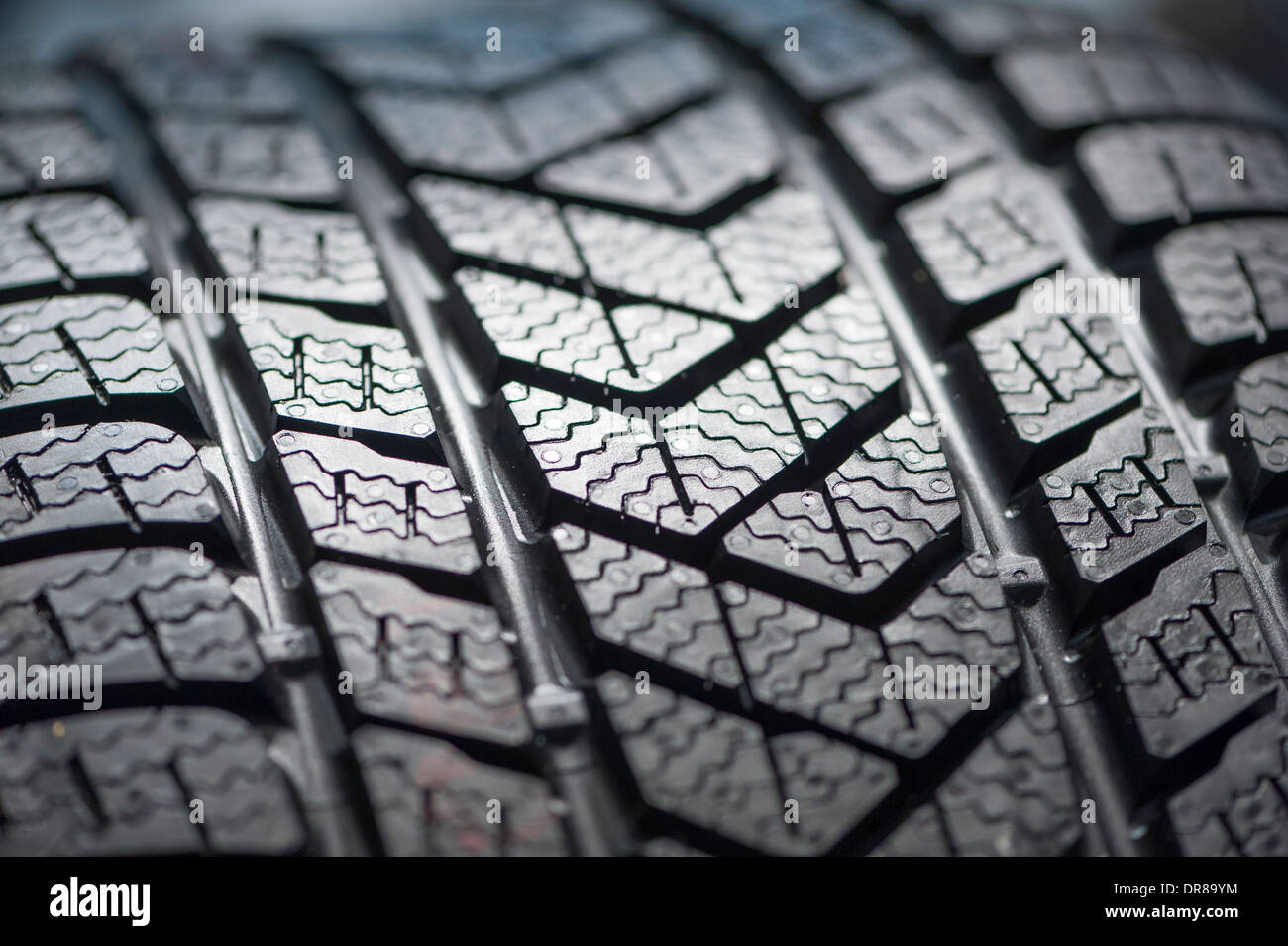 brand new winter tyre for driving on snow showing tyre profile Stock