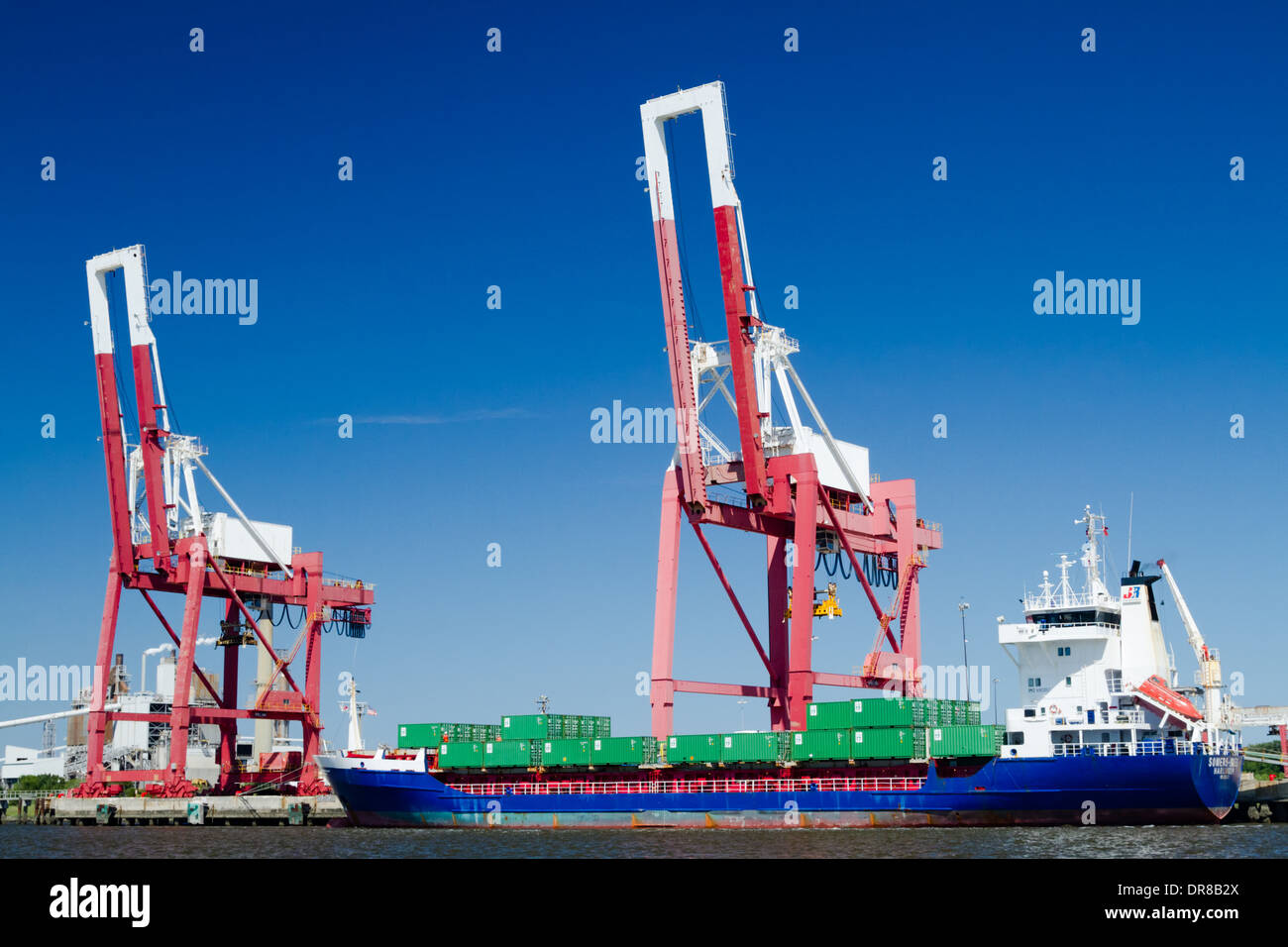 A commercial container ship in port in Fernandina Beach, Florida. Stock Photo