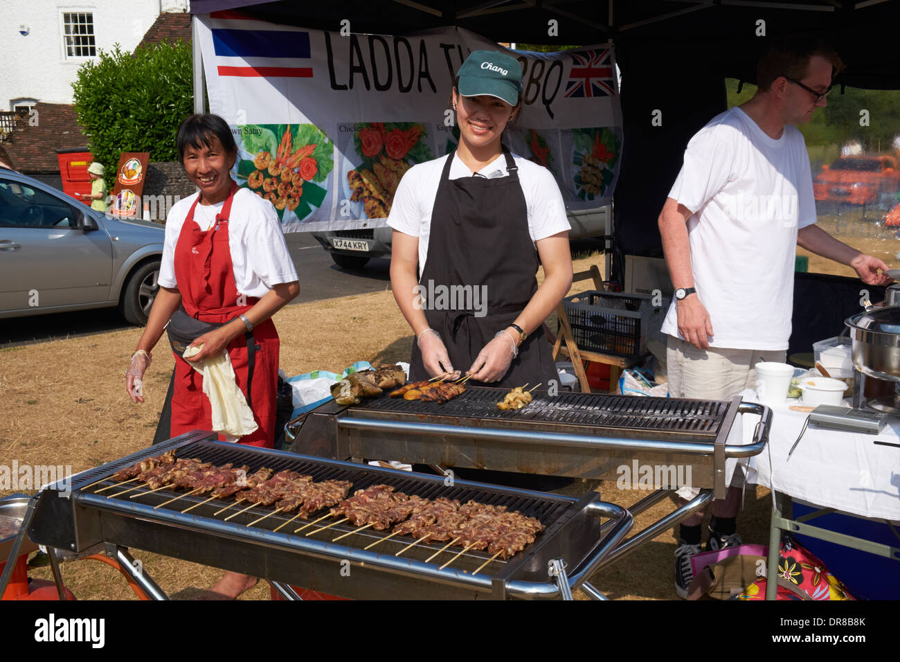 A Thai barbecue at an english village fete. Tilford, Surrey, England. Stock Photo