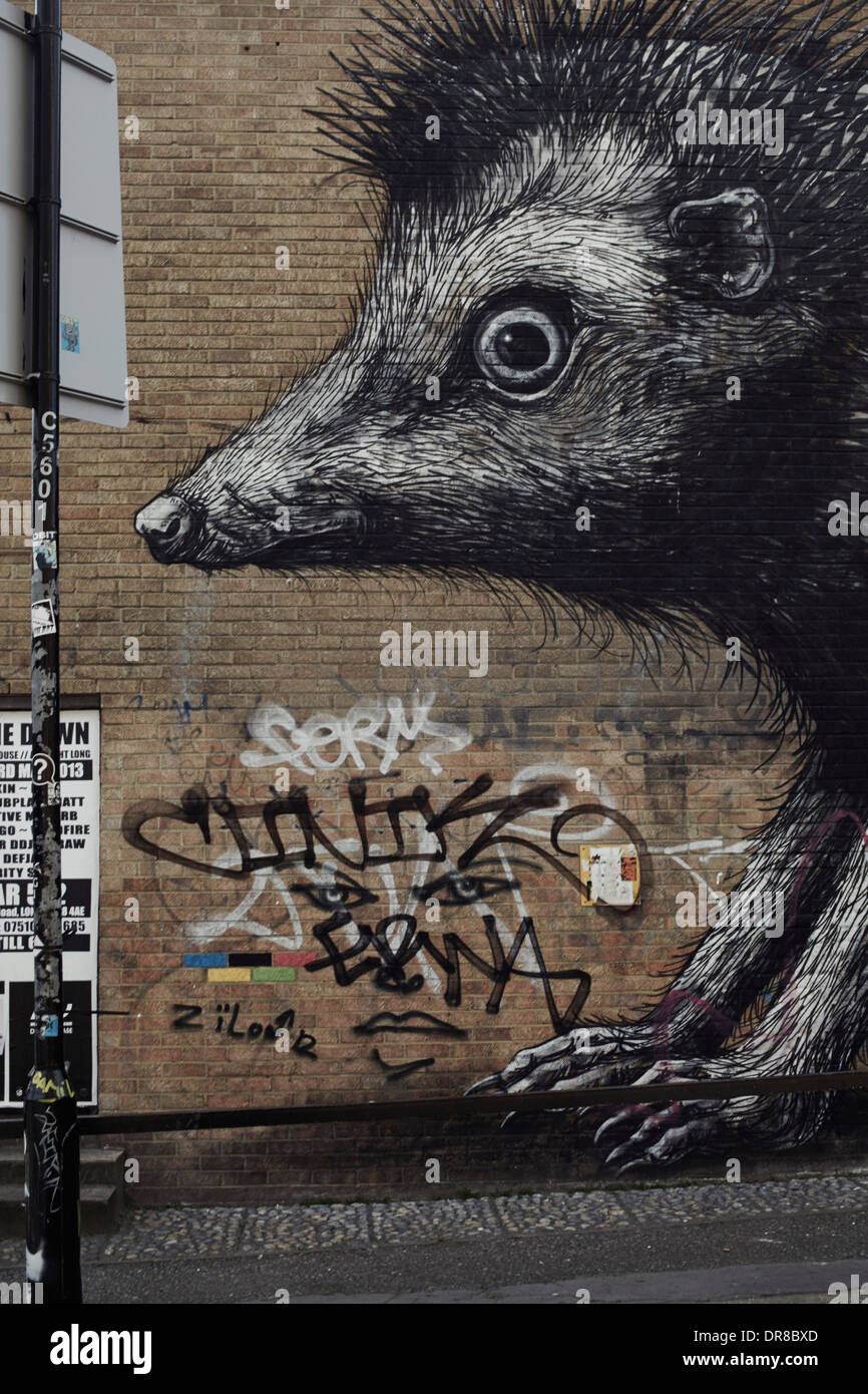 Shoreditch painting on wall of hedgehog Stock Photo