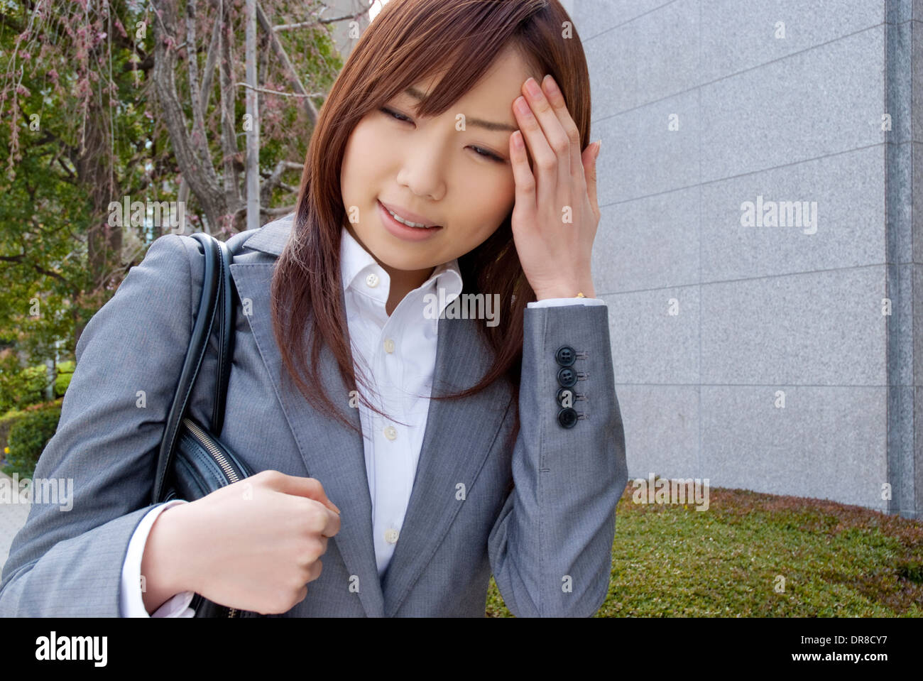Young woman having headache Stock Photo
