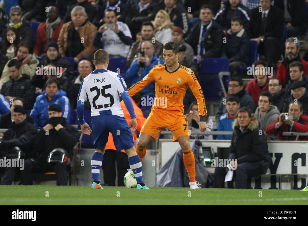 Barcelona, Spain. 21st Jan, 2014. Cristiano Ronaldo controls the ball in front of Torje during the Spanish Copa Del Rey Quarter Final game between Espanyol and Real Madrid from the Estadi Cornella-El Prat. Credit:  Action Plus Sports/Alamy Live News Stock Photo