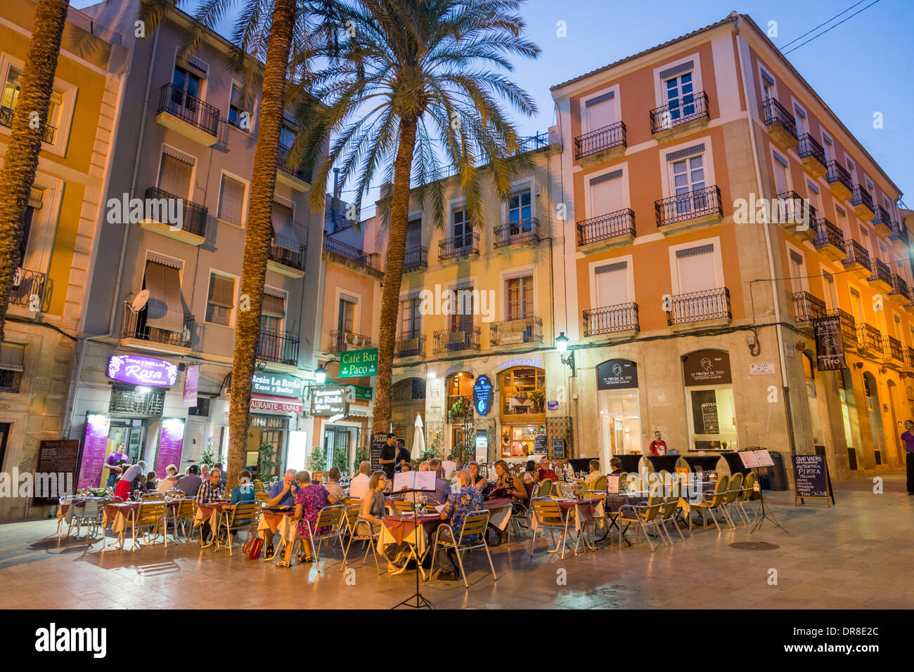 People dining at the pavement restaurants on Plaza Santisima Faz, Alicante, Costa Blanca, Spain Stock Photo