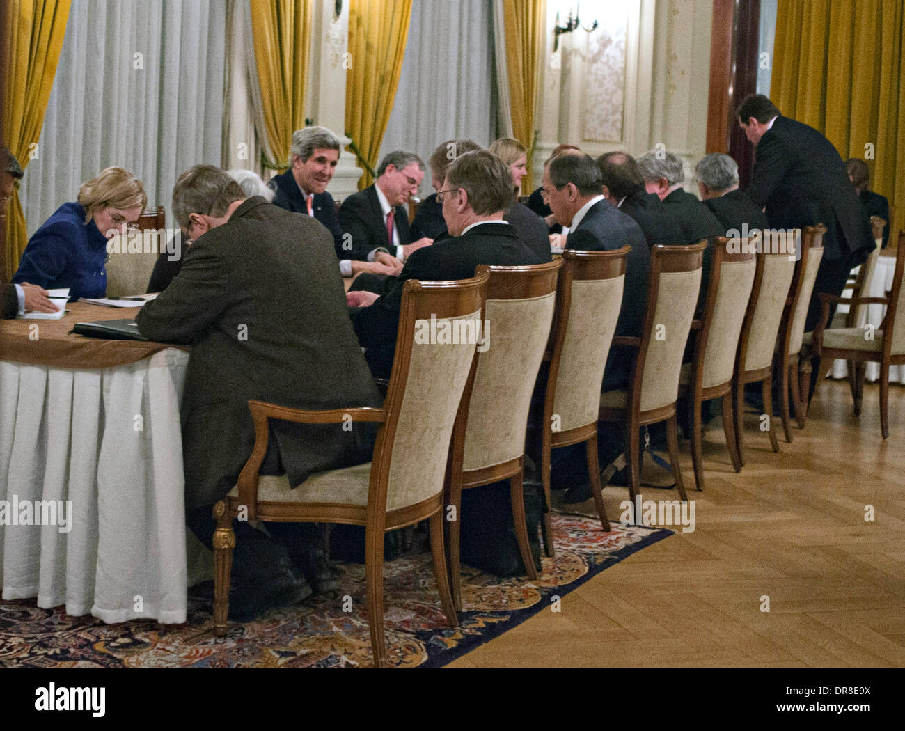 US Secretary of State John Kerry holds talks with Russian Foreign Minister Sergey Lavrov before the start of the Geneva II Conference on Syria January 21, 2014 in Montreux, Switzerland. Stock Photo