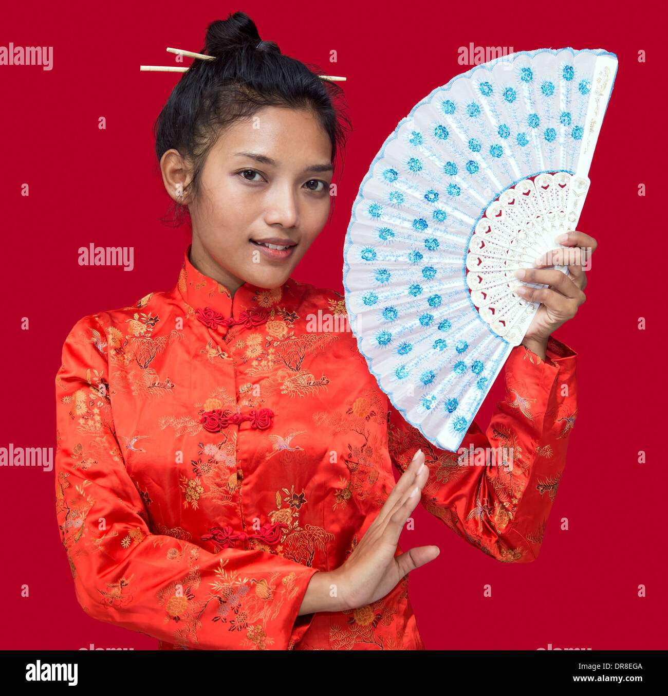 Asian girl with a fan Stock Photo - Alamy