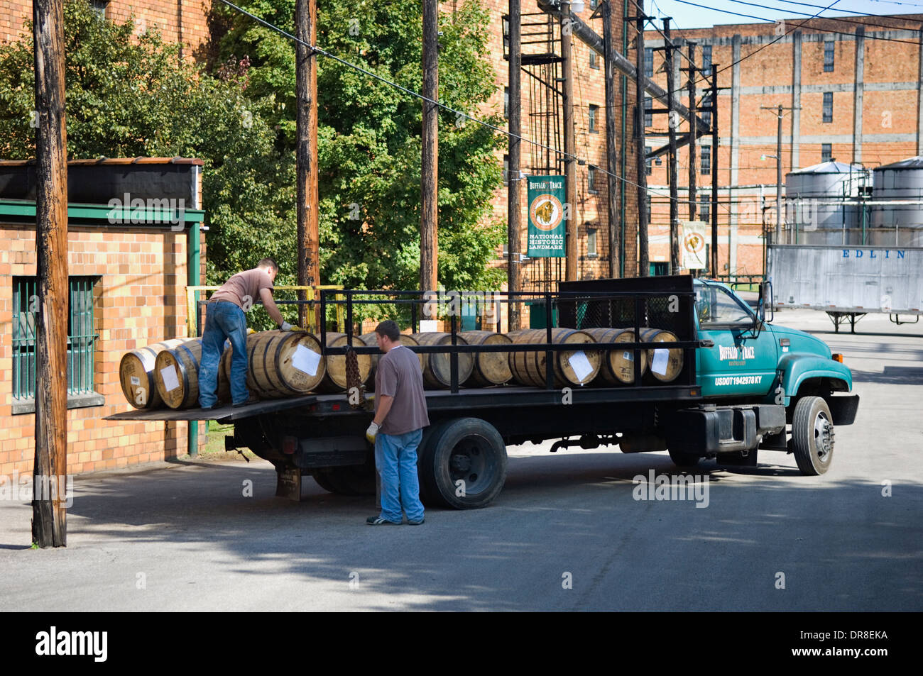 Workers at Buffalo Trace Distillery Unloading Barrels of Bourbon in Frankfort, Kentucky Stock Photo