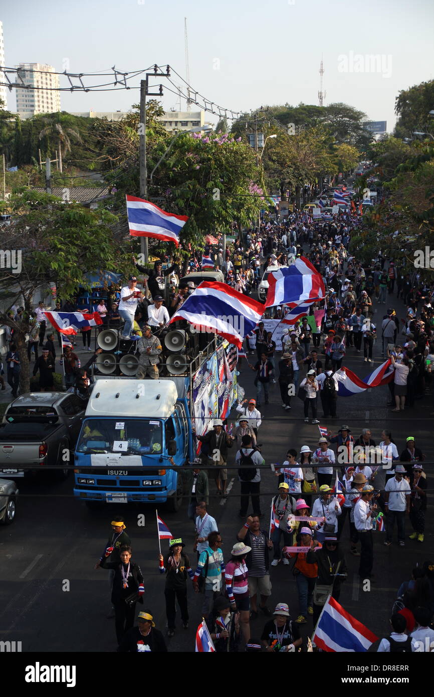 Bangkok, Thailand 21 January 2013.  Anti-goverment protesters wave Thai national flags during a march in downtown Bangkok. Thai government will impose a 60-day state of emergency in Bangkok and the surrounding provinces, start on 22 January, in an attempt to cope with the on-going political turmoil. Credit:  John Vincent/Alamy Live News Stock Photo
