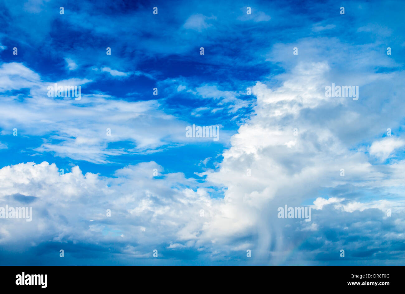 A beautiful blue sky with big puffy white clouds Stock Photo - Alamy