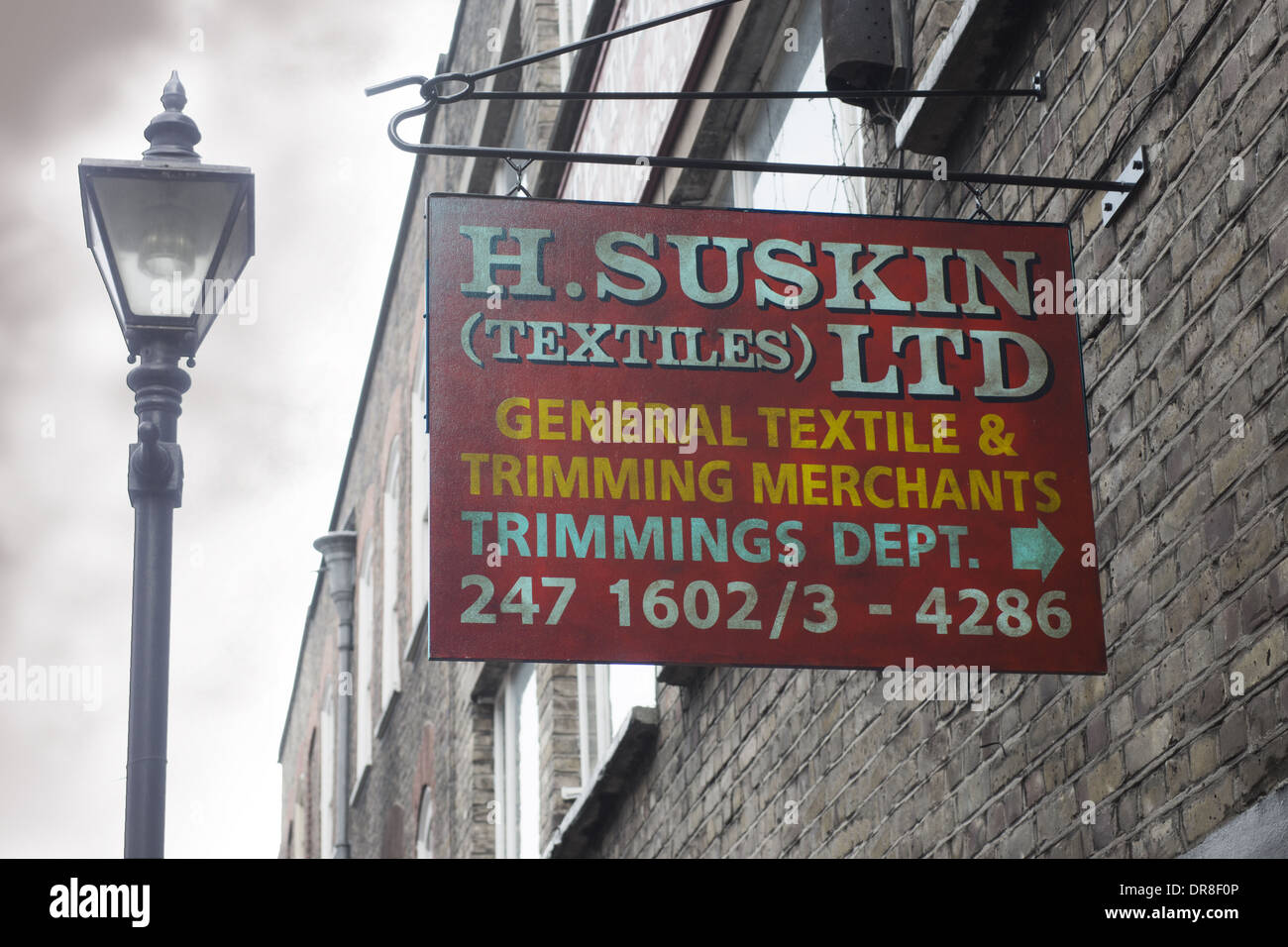 street sign jewish textile shop spitalfields artistic Stock Photo