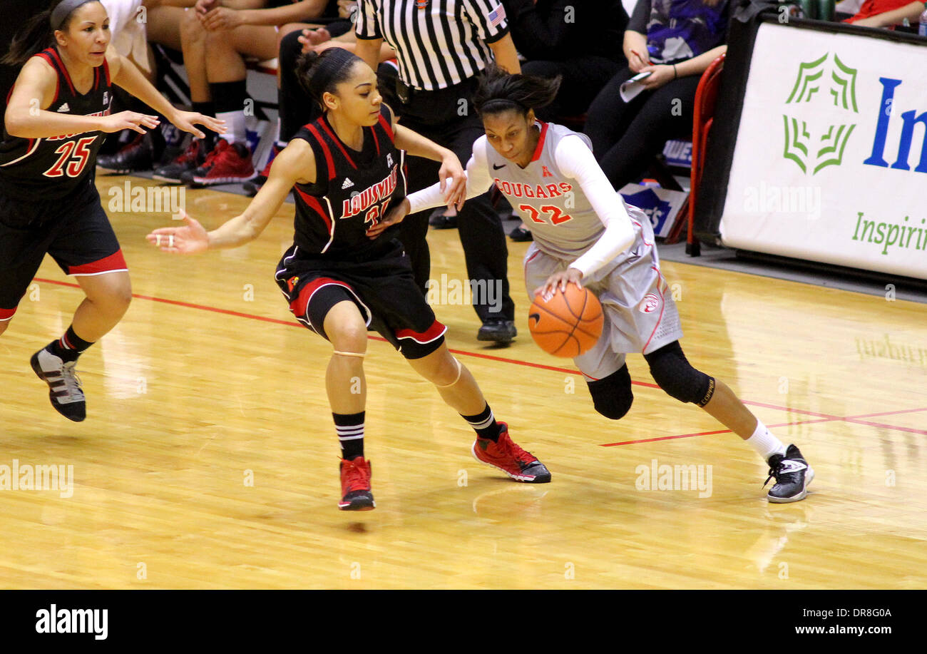 Houston, Texas, USA. 21st Jan, 2014. JAN 21 2014: University of Houston forward Marche' Amerson #22 looks to drive past Louisville guard Bria Smith #21 during the NCAA women's basketball game between Houston and Louisville from Hofheinz Pavilion in Houston, TX. Credit:  csm/Alamy Live News Stock Photo