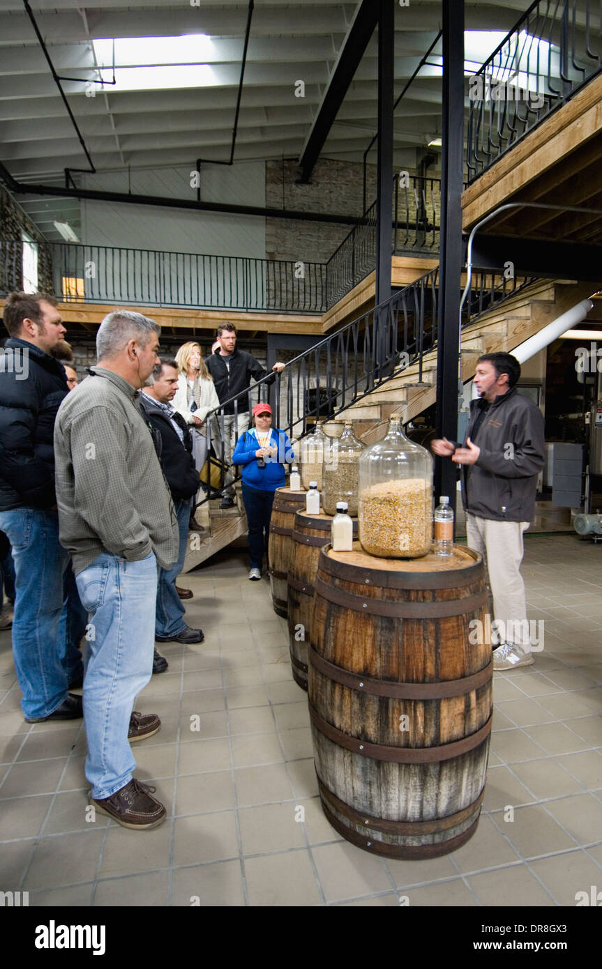 Tour Guide Explaining the Grains that go into the Mash Bill at Woodford Reserve Distillery in Woodford County, Kentucky Stock Photo