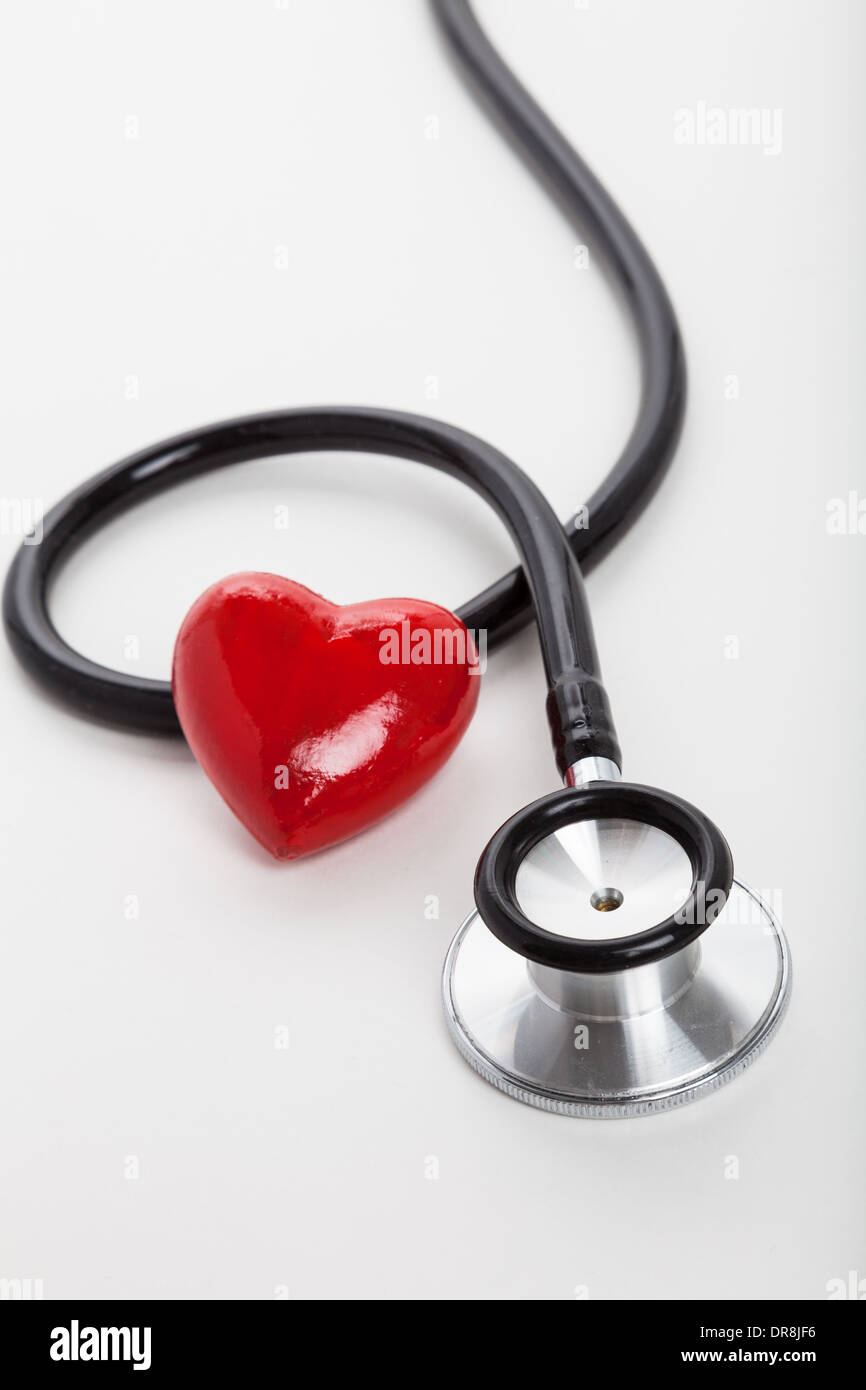 Stethoscope and red heart, heart disease Stock Photo