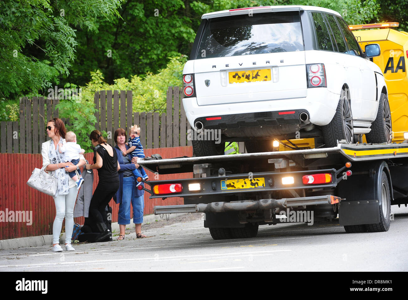 Danielle Lloyd  takes her children to a charity day at Camelot theme park, organised by the Liverpool Taxi drivers association.  Danielle was rescued at the roadside by the AA after her Range Rover broke down. Liverpool, England - 20.06.12 Stock Photo