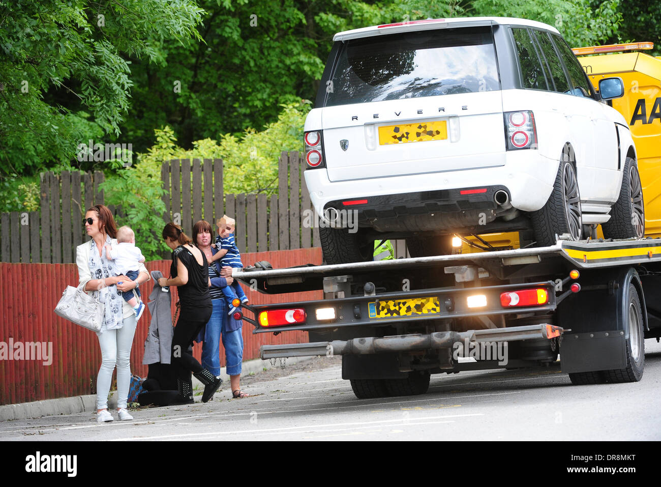 Danielle Lloyd  takes her children to a charity day at Camelot theme park, organised by the Liverpool Taxi drivers association.  Danielle was rescued at the roadside by the AA after her Range Rover broke down. Liverpool, England - 20.06.12 Stock Photo