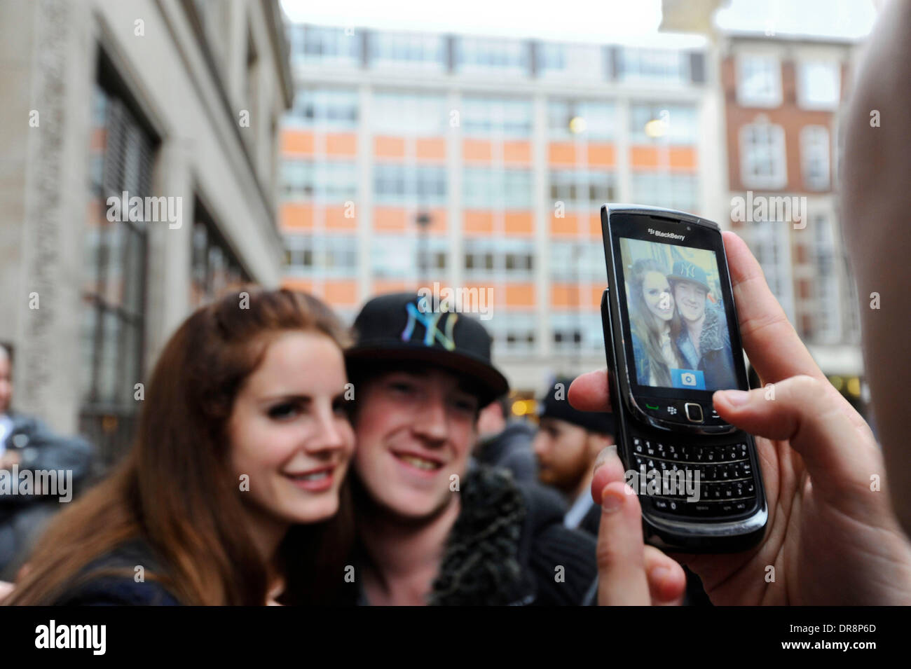 Lana Del Rey signs autographs for fans  at the BBC Radio 1 studios London, England - 21.06.12 Stock Photo