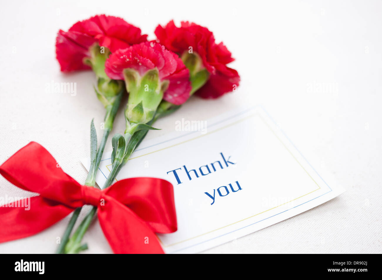 a thank you note with flowers Stock Photo - Alamy
