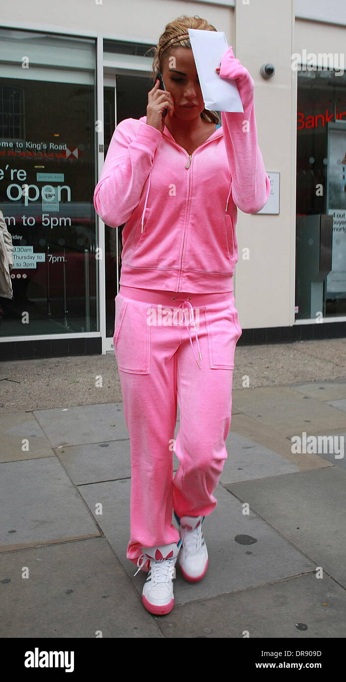 Katie Price stops into a bank and retrieves a large envelope of cash London England 08.06.12 Credit Mandatory benjilaliography WENN Stock Photo Alamy