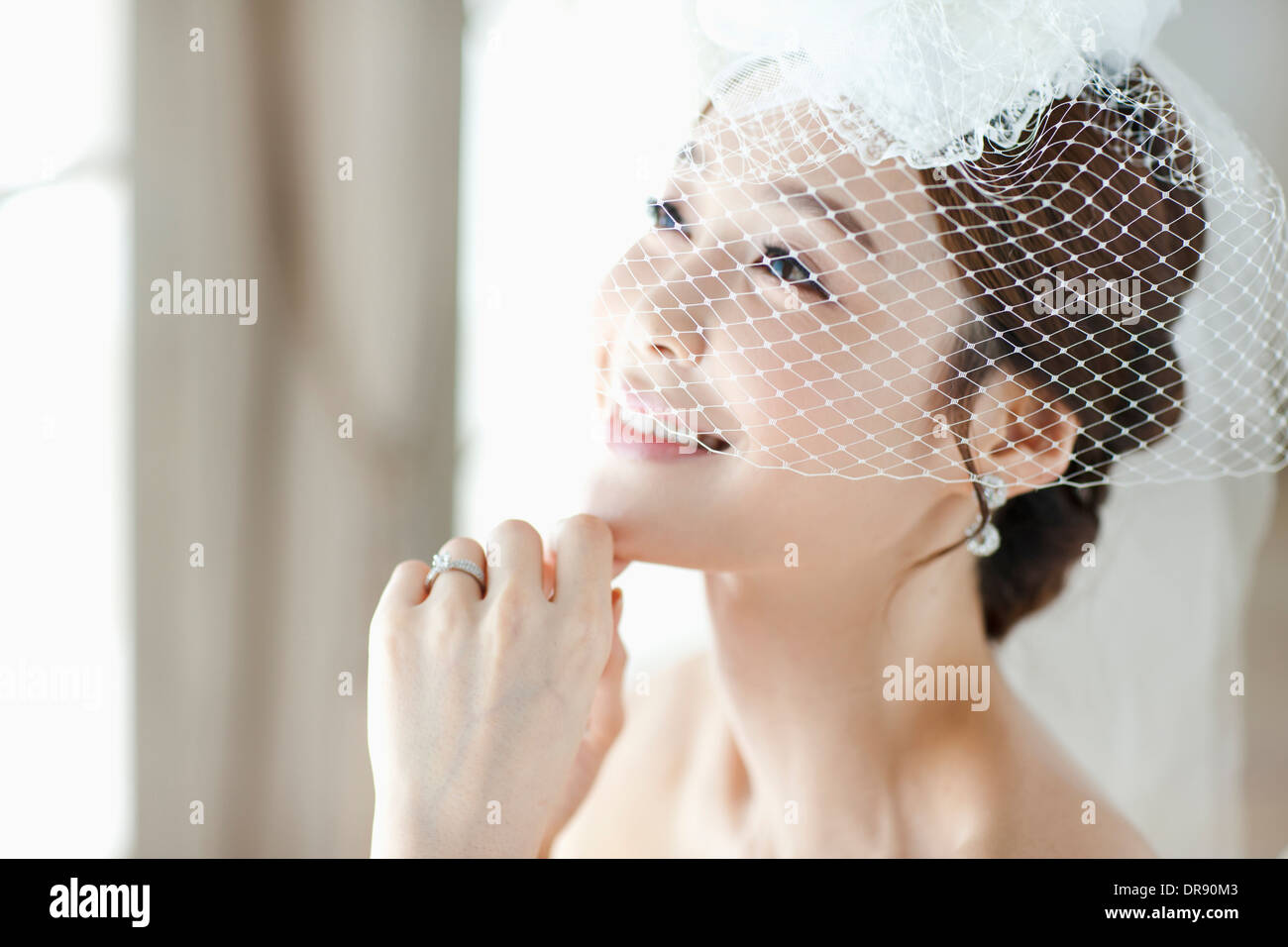close up shot of a woman wearing wedding veils Stock Photo