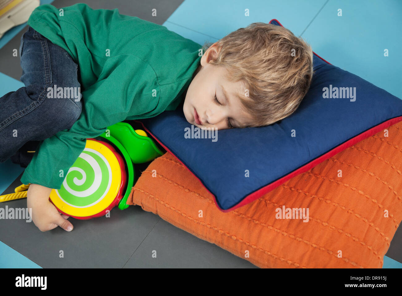 Boy sleeping With Toy In Kindergarten Stock Photo Alamy