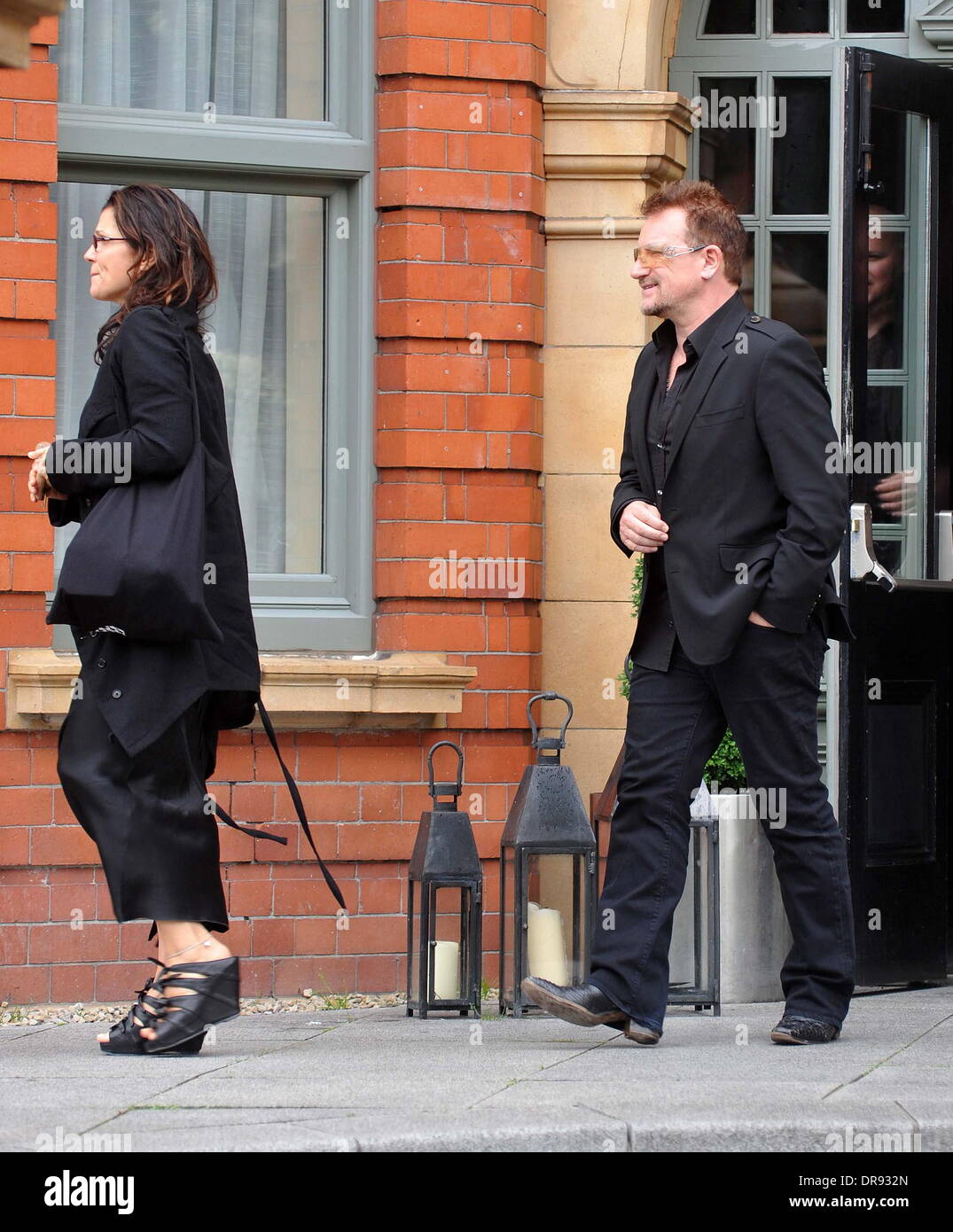Ali Hewson and Bono U2 guitarist, The Edge meets Bono at the Dylan hotel amid reports that his mother Gwenda Evans has died Dublin, Ireland - 13.06.12 Stock Photo