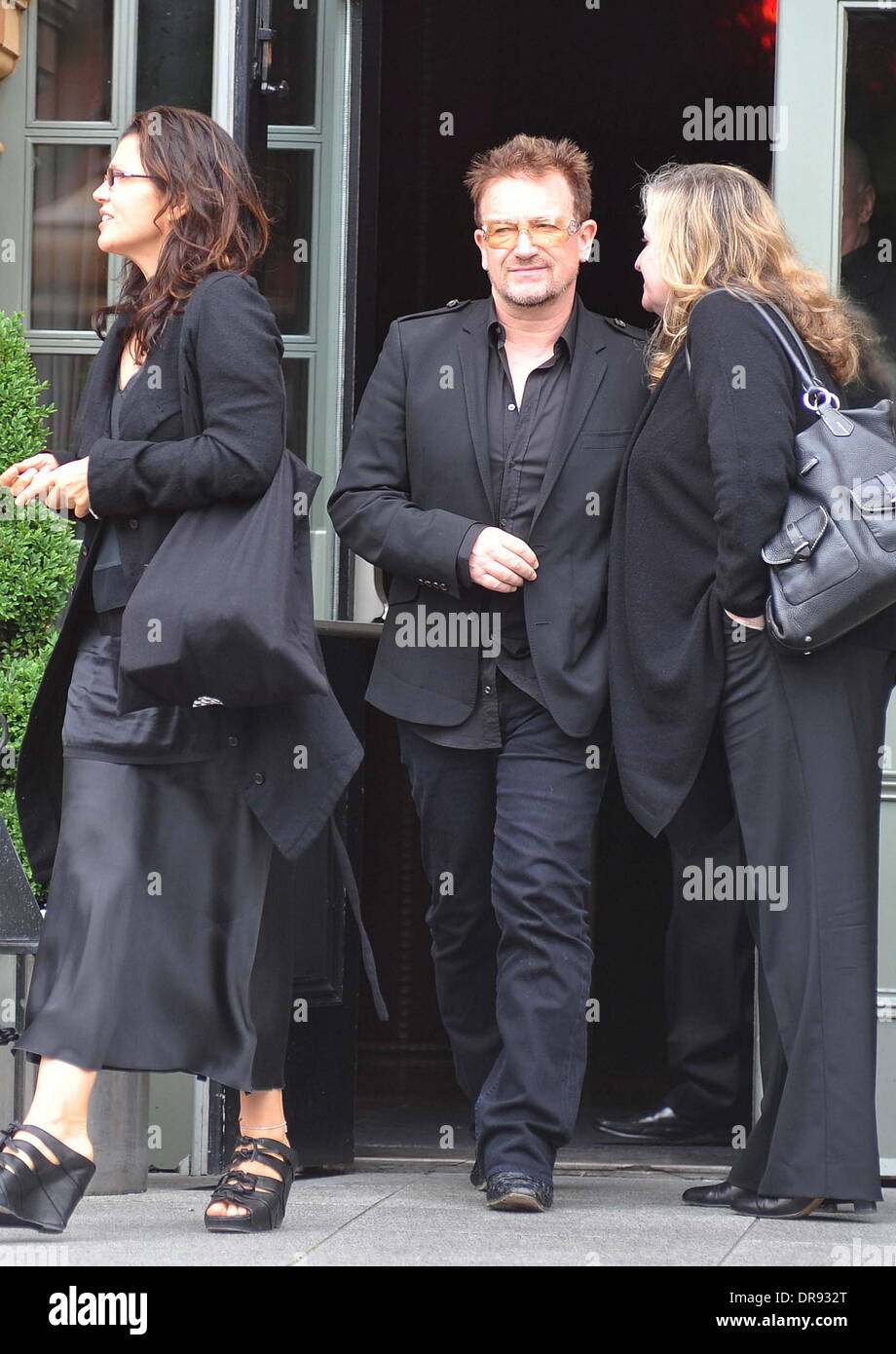 Ali Hewson and Bono U2 guitarist, The Edge meets Bono at the Dylan hotel amid reports that his mother Gwenda Evans has died Dublin, Ireland - 13.06.12 Stock Photo