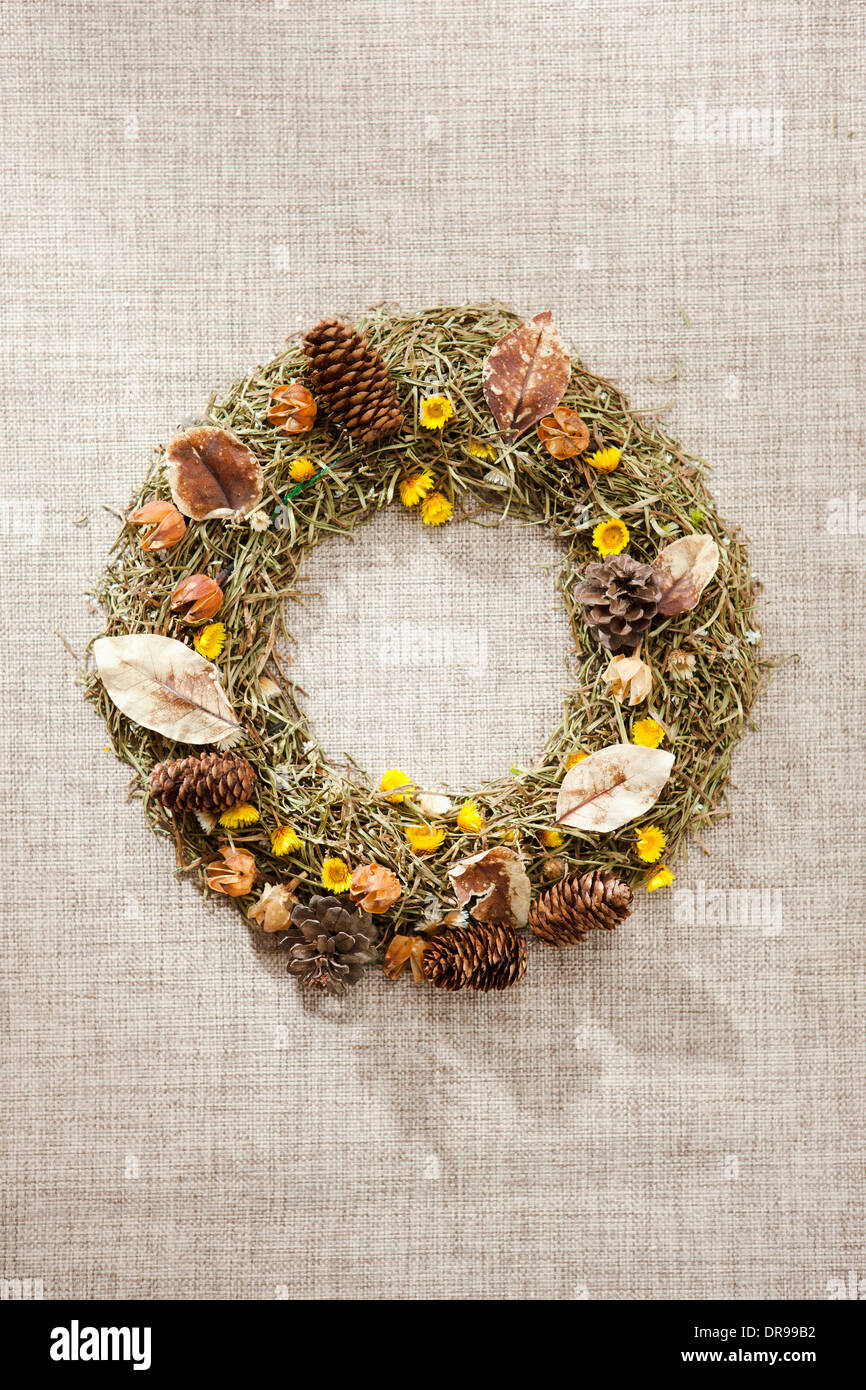 a wreath with autumn leaves and nuts Stock Photo
