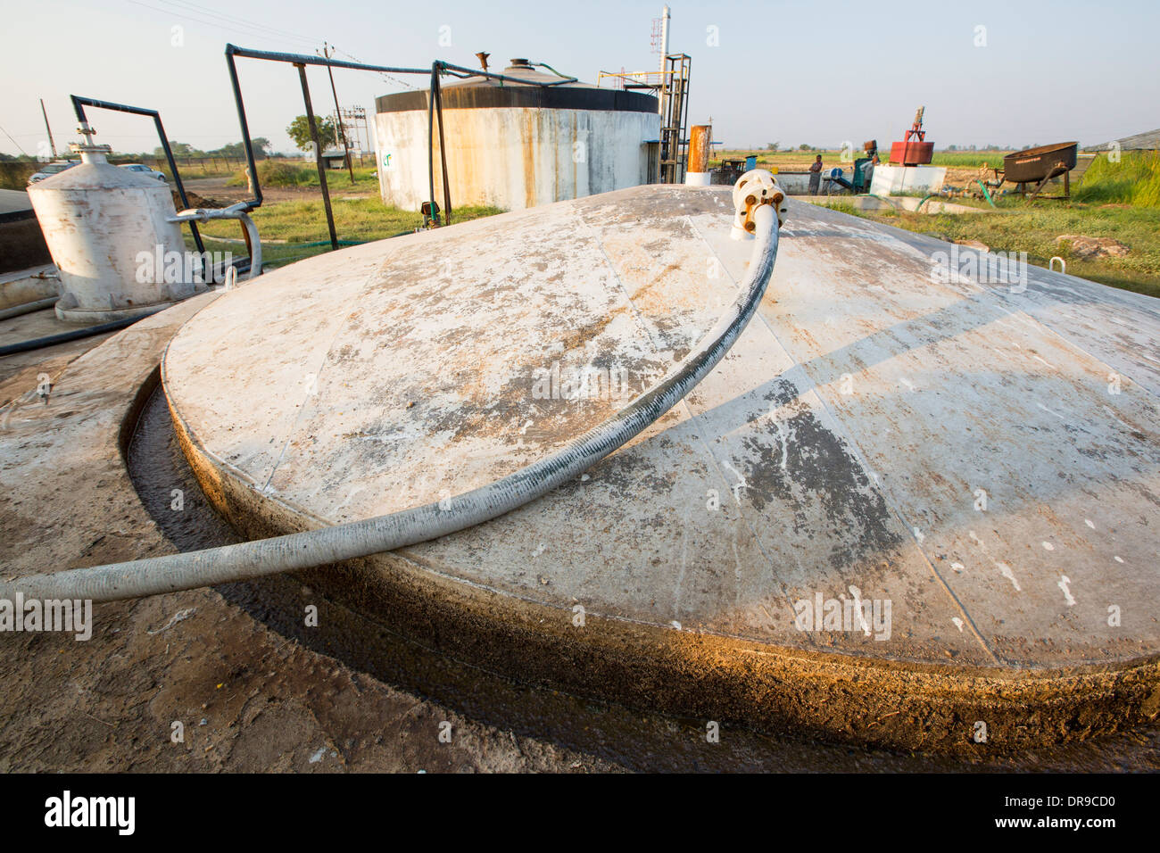 biogas plant, that is fed with food waste and manure and fuels the kitchens at The Muni Seva Ashram in Goraj, India Stock Photo