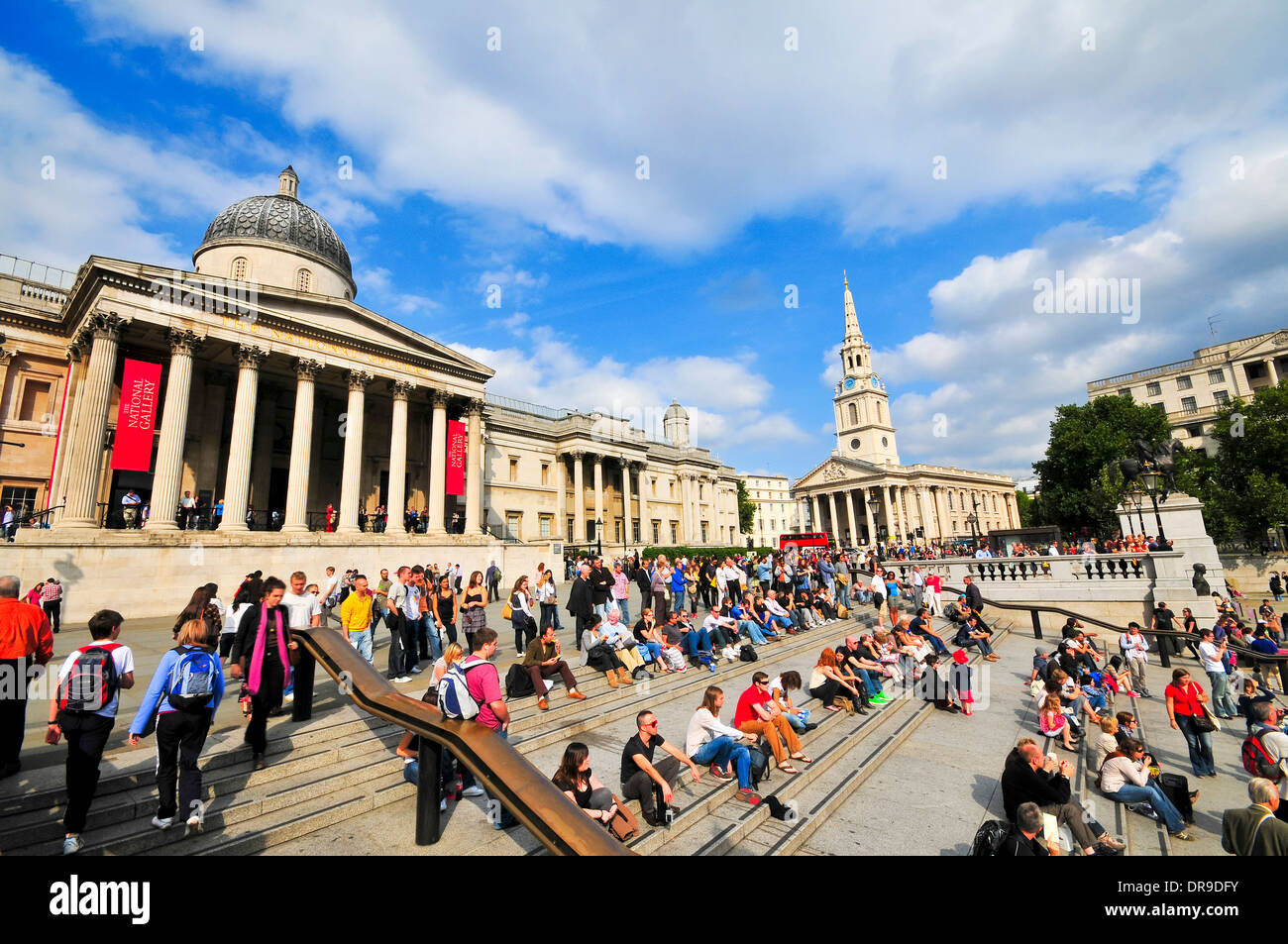 People sitting in front of National Gallery in London Stock Photo