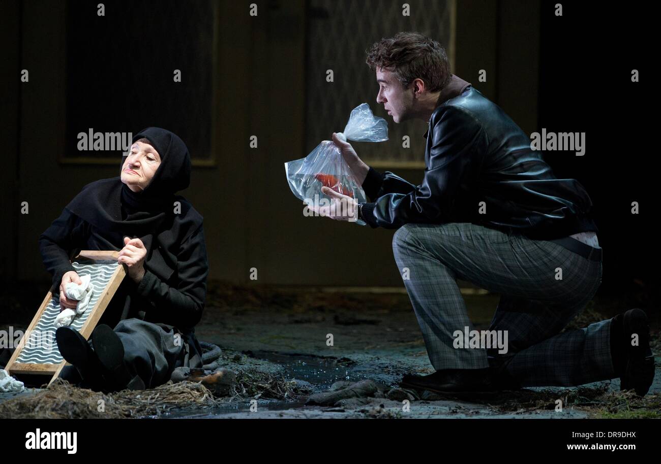 Berlin, Germany. 20th Jan, 2014. German tenor Florian Hoffmann (Kudrjasch) and Russian singer and actress Emma Sarkisyan (Glascha) perform during the rehearsal for the opera "Kat'a Kabanova" at the State Opera in the Schillertheater in Berlin, Germany, 20 January 2014. The opera by Leos Janacek and directed by Simon Rattle will premiere on 25 January 2014. Photo: SOEREN STACHE/dpa/Alamy Live News Stock Photo