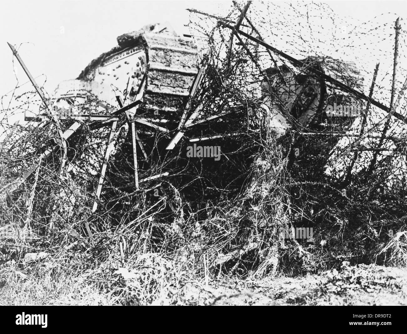 Tank in barbed wire Stock Photo